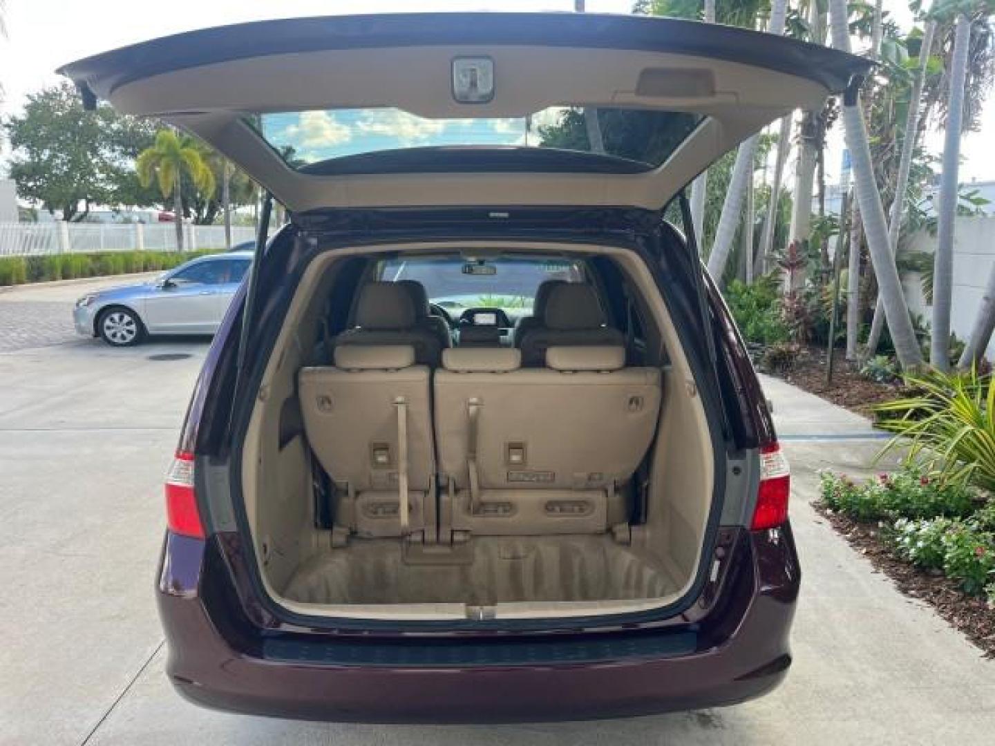 2007 Dark Cherry Pearl /Ivory Honda Odyssey SUNROOF NAV 1 FL EX-L LOW MILES 67,947 (5FNRL38627B) with an 3.5L SOHC MPFI 24-Valve i-VTEC V6 Engine engine, Automatic transmission, located at 4701 North Dixie Hwy, Pompano Beach, FL, 33064, (954) 422-2889, 26.240938, -80.123474 - OUR WEBPAGE FLORIDACARS1.COM HAS OVER 100 PHOTOS AND FREE CARFAX LINK 2007 HONDA ODYSSEY EX-L 26 MPG ROAD READY 3.5L V6 VIN: 5FNRL38627B442296 POWER SEATS NO ACCIDENTS NO RECALLS VAN LOW MILES 67,947 1 OWNER FLORIDA 3.5L V6 F SOHC 24V NAVIGATION POWER SLIDING DOORS GASOLINE BACK UP CAMERA POWER SUNR - Photo#67