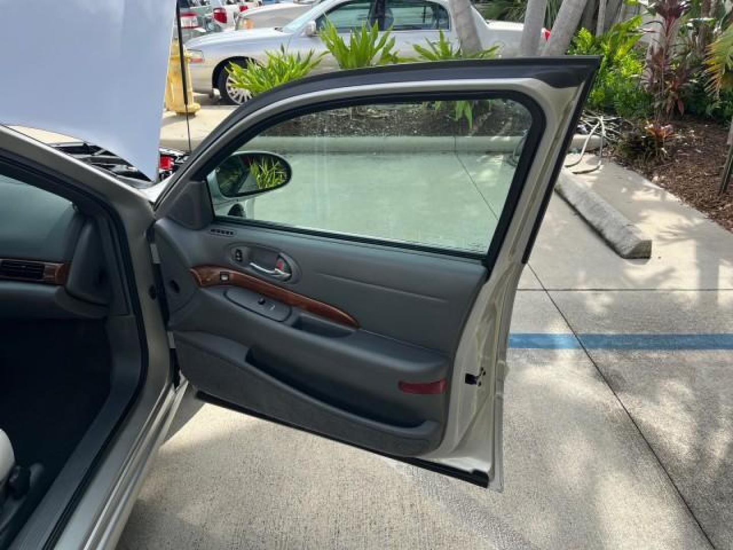 2004 Steelmist Metallic /Medium Gray Buick LeSabre 1 OWNER VERY LOW MILES 49,946 (1G4HP52K144) with an 3.8L 3800 V6 SFI Engine engine, Automatic transmission, located at 4701 North Dixie Hwy, Pompano Beach, FL, 33064, (954) 422-2889, 26.240938, -80.123474 - OUR WEBPAGE FLORIDACARS1.COM HAS OVER 100 PHOTOS AND FREE CARFAX LINK 2004 BUICK LESABRE CUSTOM ROAD READY 3.8L V6 VIN: 1G4HP52K144154477 NO ACCIDENTS 29 MPG SEDAN 4 DR NO RECALLS 3.8L V6 F OHV 1 OWNER 3.8L V6 GASOLINE LOW MILES 49,946 FRONT WHEEL DRIVE 25 SERVICE RECORDS POWER LEATHER SEATS Air Sus - Photo#11