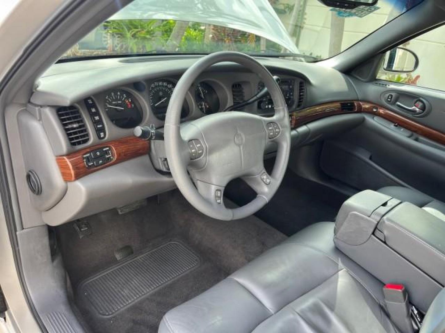 2004 Steelmist Metallic /Medium Gray Buick LeSabre 1 OWNER VERY LOW MILES 49,946 (1G4HP52K144) with an 3.8L 3800 V6 SFI Engine engine, Automatic transmission, located at 4701 North Dixie Hwy, Pompano Beach, FL, 33064, (954) 422-2889, 26.240938, -80.123474 - OUR WEBPAGE FLORIDACARS1.COM HAS OVER 100 PHOTOS AND FREE CARFAX LINK 2004 BUICK LESABRE CUSTOM ROAD READY 3.8L V6 VIN: 1G4HP52K144154477 NO ACCIDENTS 29 MPG SEDAN 4 DR NO RECALLS 3.8L V6 F OHV 1 OWNER 3.8L V6 GASOLINE LOW MILES 49,946 FRONT WHEEL DRIVE 25 SERVICE RECORDS POWER LEATHER SEATS Air Sus - Photo#45