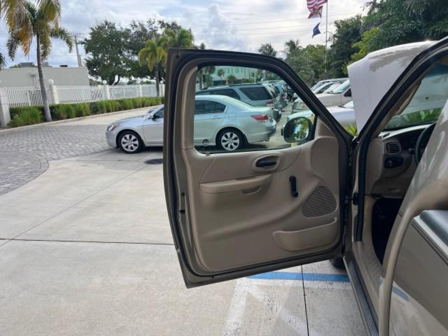 2001 Arizona Beige Metallic /Medium Graphite Ford F-150 XL PU LOW MILES 71,934 (1FTZF17251N) with an 4.2L SEFI V6 Engine engine, Automatic transmission, located at 4701 North Dixie Hwy, Pompano Beach, FL, 33064, (954) 422-2889, 26.240938, -80.123474 - OUR WEBPAGE FLORIDACARS1.COM HAS OVER 100 PHOTOS AND FREE CARFAX LINK 2001 FORD F-150 XL ROAD READY WORK READY PICKUP NO ACCIDENTS 4.2L V6 4.2L V6 F SOHC AUTO AC LOW MILES 71,934 GASOLINE 8 SERVICE RECORDS REAR WHEEL DRIVE 8.1 FT BED LENGTH XL Anti-Theft System Approach Lights RWD THIS IS ONE OF THE - Photo#9