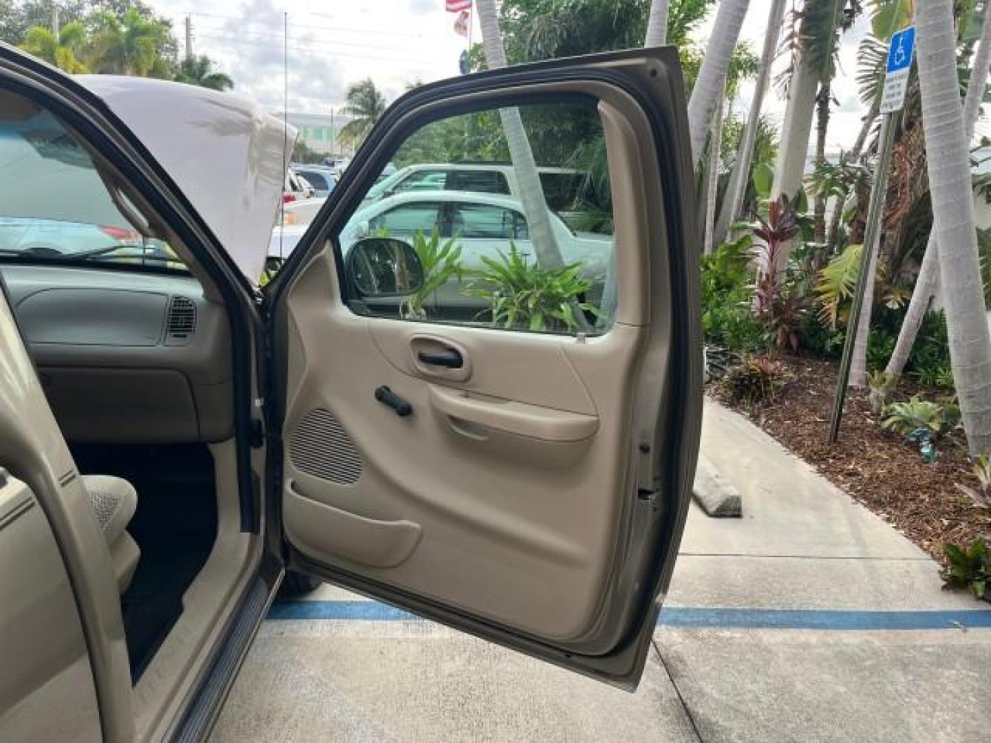 2001 Arizona Beige Metallic /Medium Graphite Ford F-150 XL PU LOW MILES 71,934 (1FTZF17251N) with an 4.2L SEFI V6 Engine engine, Automatic transmission, located at 4701 North Dixie Hwy, Pompano Beach, FL, 33064, (954) 422-2889, 26.240938, -80.123474 - OUR WEBPAGE FLORIDACARS1.COM HAS OVER 100 PHOTOS AND FREE CARFAX LINK 2001 FORD F-150 XL ROAD READY WORK READY PICKUP NO ACCIDENTS 4.2L V6 4.2L V6 F SOHC AUTO AC LOW MILES 71,934 GASOLINE 8 SERVICE RECORDS REAR WHEEL DRIVE 8.1 FT BED LENGTH XL Anti-Theft System Approach Lights RWD THIS IS ONE OF THE - Photo#11