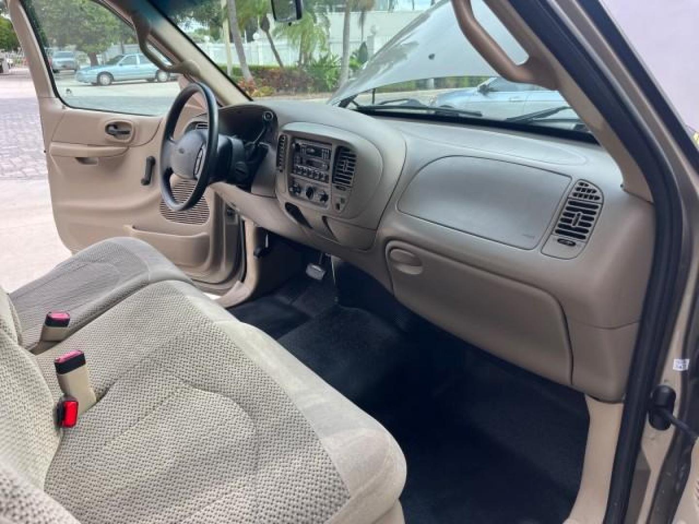 2001 Arizona Beige Metallic /Medium Graphite Ford F-150 XL PU LOW MILES 71,934 (1FTZF17251N) with an 4.2L SEFI V6 Engine engine, Automatic transmission, located at 4701 North Dixie Hwy, Pompano Beach, FL, 33064, (954) 422-2889, 26.240938, -80.123474 - OUR WEBPAGE FLORIDACARS1.COM HAS OVER 100 PHOTOS AND FREE CARFAX LINK 2001 FORD F-150 XL ROAD READY WORK READY PICKUP NO ACCIDENTS 4.2L V6 4.2L V6 F SOHC AUTO AC LOW MILES 71,934 GASOLINE 8 SERVICE RECORDS REAR WHEEL DRIVE 8.1 FT BED LENGTH XL Anti-Theft System Approach Lights RWD THIS IS ONE OF THE - Photo#27