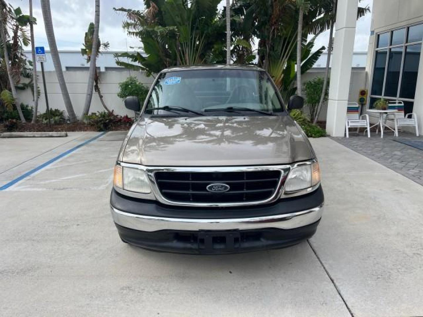 2001 Arizona Beige Metallic /Medium Graphite Ford F-150 XL PU LOW MILES 71,934 (1FTZF17251N) with an 4.2L SEFI V6 Engine engine, Automatic transmission, located at 4701 North Dixie Hwy, Pompano Beach, FL, 33064, (954) 422-2889, 26.240938, -80.123474 - OUR WEBPAGE FLORIDACARS1.COM HAS OVER 100 PHOTOS AND FREE CARFAX LINK 2001 FORD F-150 XL ROAD READY WORK READY PICKUP NO ACCIDENTS 4.2L V6 4.2L V6 F SOHC AUTO AC LOW MILES 71,934 GASOLINE 8 SERVICE RECORDS REAR WHEEL DRIVE 8.1 FT BED LENGTH XL Anti-Theft System Approach Lights RWD THIS IS ONE OF THE - Photo#2