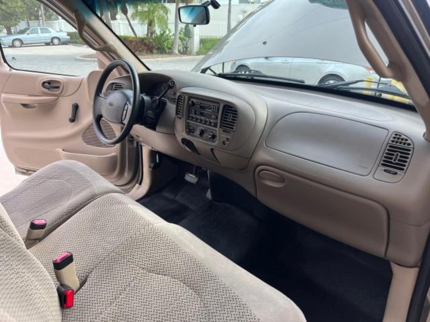 2001 Arizona Beige Metallic /Medium Graphite Ford F-150 XL PU LOW MILES 71,934 (1FTZF17251N) with an 4.2L SEFI V6 Engine engine, Automatic transmission, located at 4701 North Dixie Hwy, Pompano Beach, FL, 33064, (954) 422-2889, 26.240938, -80.123474 - OUR WEBPAGE FLORIDACARS1.COM HAS OVER 100 PHOTOS AND FREE CARFAX LINK 2001 FORD F-150 XL ROAD READY WORK READY PICKUP NO ACCIDENTS 4.2L V6 4.2L V6 F SOHC AUTO AC LOW MILES 71,934 GASOLINE 8 SERVICE RECORDS REAR WHEEL DRIVE 8.1 FT BED LENGTH XL Anti-Theft System Approach Lights RWD THIS IS ONE OF THE - Photo#32