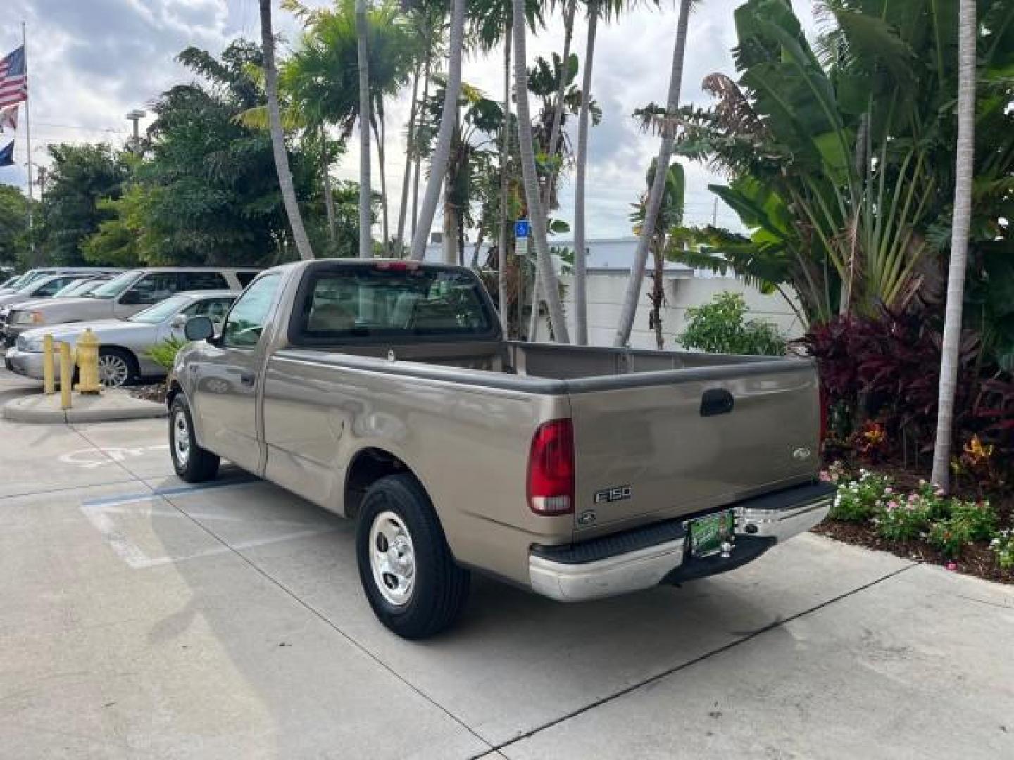 2001 Arizona Beige Metallic /Medium Graphite Ford F-150 XL PU LOW MILES 71,934 (1FTZF17251N) with an 4.2L SEFI V6 Engine engine, Automatic transmission, located at 4701 North Dixie Hwy, Pompano Beach, FL, 33064, (954) 422-2889, 26.240938, -80.123474 - OUR WEBPAGE FLORIDACARS1.COM HAS OVER 100 PHOTOS AND FREE CARFAX LINK 2001 FORD F-150 XL ROAD READY WORK READY PICKUP NO ACCIDENTS 4.2L V6 4.2L V6 F SOHC AUTO AC LOW MILES 71,934 GASOLINE 8 SERVICE RECORDS REAR WHEEL DRIVE 8.1 FT BED LENGTH XL Anti-Theft System Approach Lights RWD THIS IS ONE OF THE - Photo#5