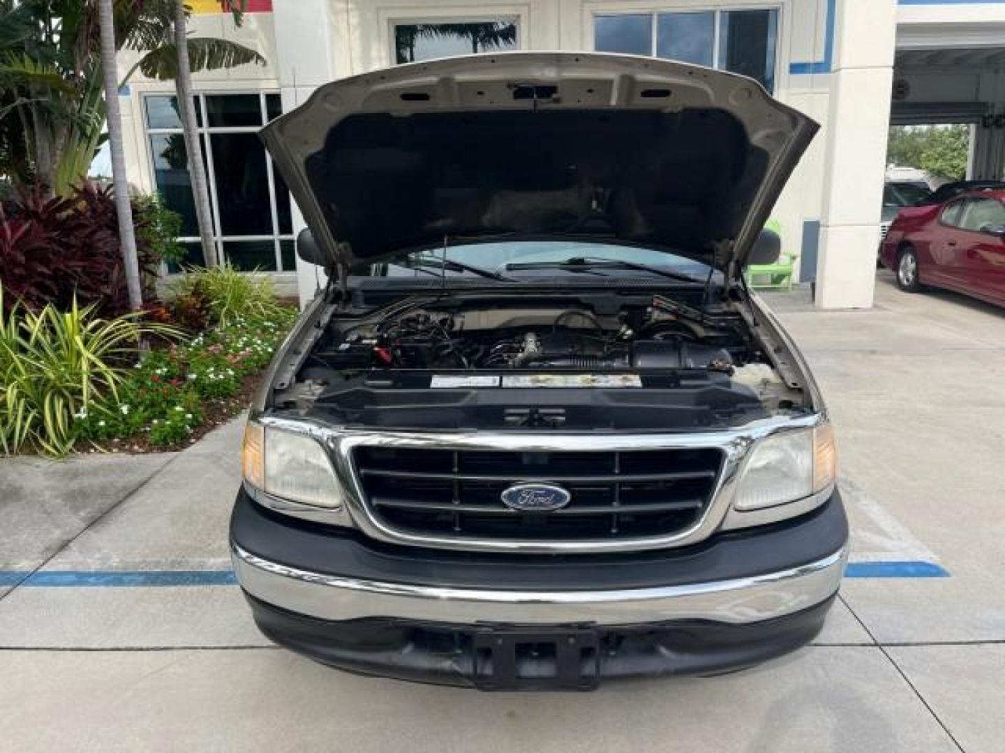 2001 Arizona Beige Metallic /Medium Graphite Ford F-150 XL PU LOW MILES 71,934 (1FTZF17251N) with an 4.2L SEFI V6 Engine engine, Automatic transmission, located at 4701 North Dixie Hwy, Pompano Beach, FL, 33064, (954) 422-2889, 26.240938, -80.123474 - OUR WEBPAGE FLORIDACARS1.COM HAS OVER 100 PHOTOS AND FREE CARFAX LINK 2001 FORD F-150 XL ROAD READY WORK READY PICKUP NO ACCIDENTS 4.2L V6 4.2L V6 F SOHC AUTO AC LOW MILES 71,934 GASOLINE 8 SERVICE RECORDS REAR WHEEL DRIVE 8.1 FT BED LENGTH XL Anti-Theft System Approach Lights RWD THIS IS ONE OF THE - Photo#61