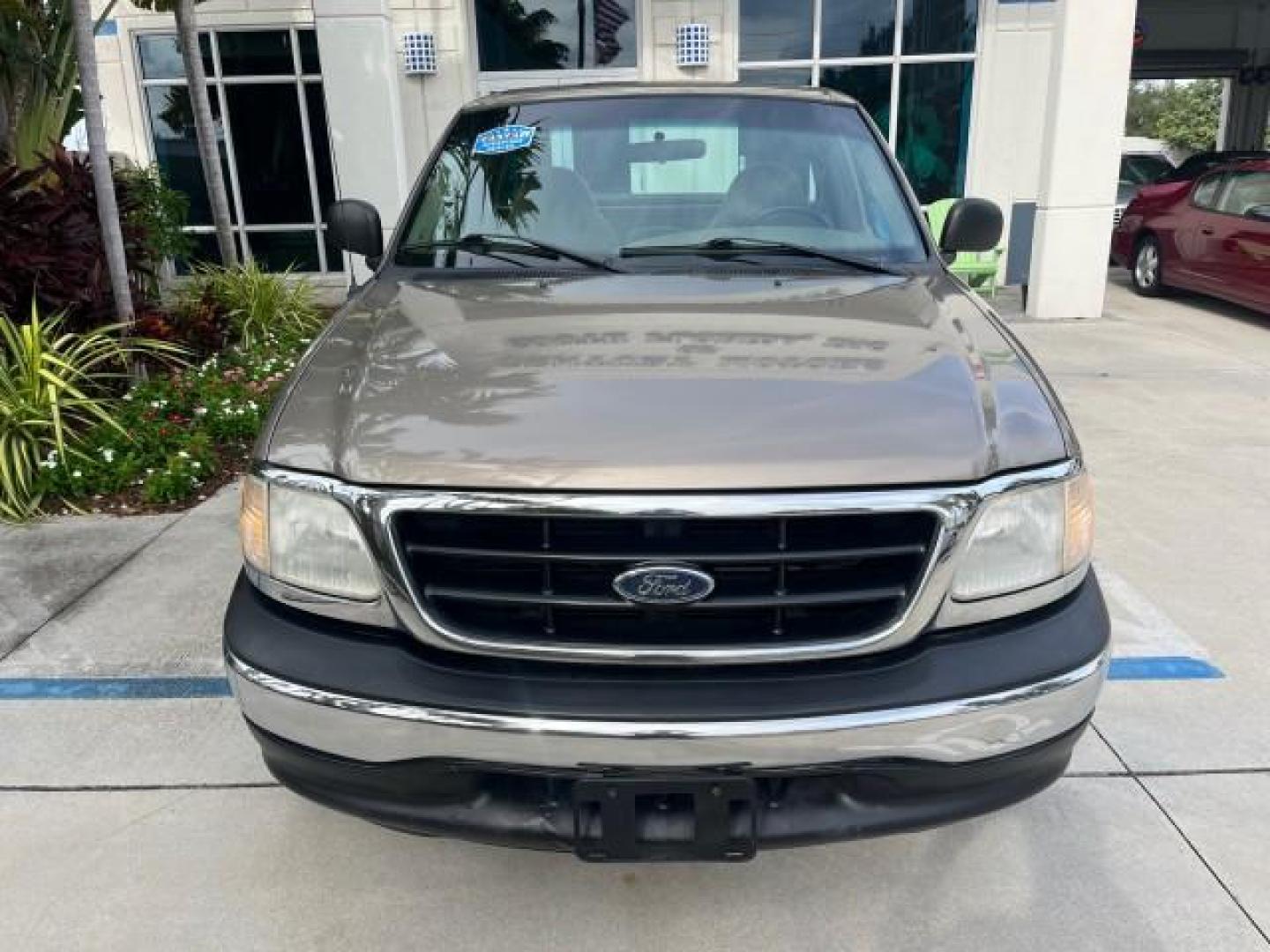 2001 Arizona Beige Metallic /Medium Graphite Ford F-150 XL PU LOW MILES 71,934 (1FTZF17251N) with an 4.2L SEFI V6 Engine engine, Automatic transmission, located at 4701 North Dixie Hwy, Pompano Beach, FL, 33064, (954) 422-2889, 26.240938, -80.123474 - OUR WEBPAGE FLORIDACARS1.COM HAS OVER 100 PHOTOS AND FREE CARFAX LINK 2001 FORD F-150 XL ROAD READY WORK READY PICKUP NO ACCIDENTS 4.2L V6 4.2L V6 F SOHC AUTO AC LOW MILES 71,934 GASOLINE 8 SERVICE RECORDS REAR WHEEL DRIVE 8.1 FT BED LENGTH XL Anti-Theft System Approach Lights RWD THIS IS ONE OF THE - Photo#66