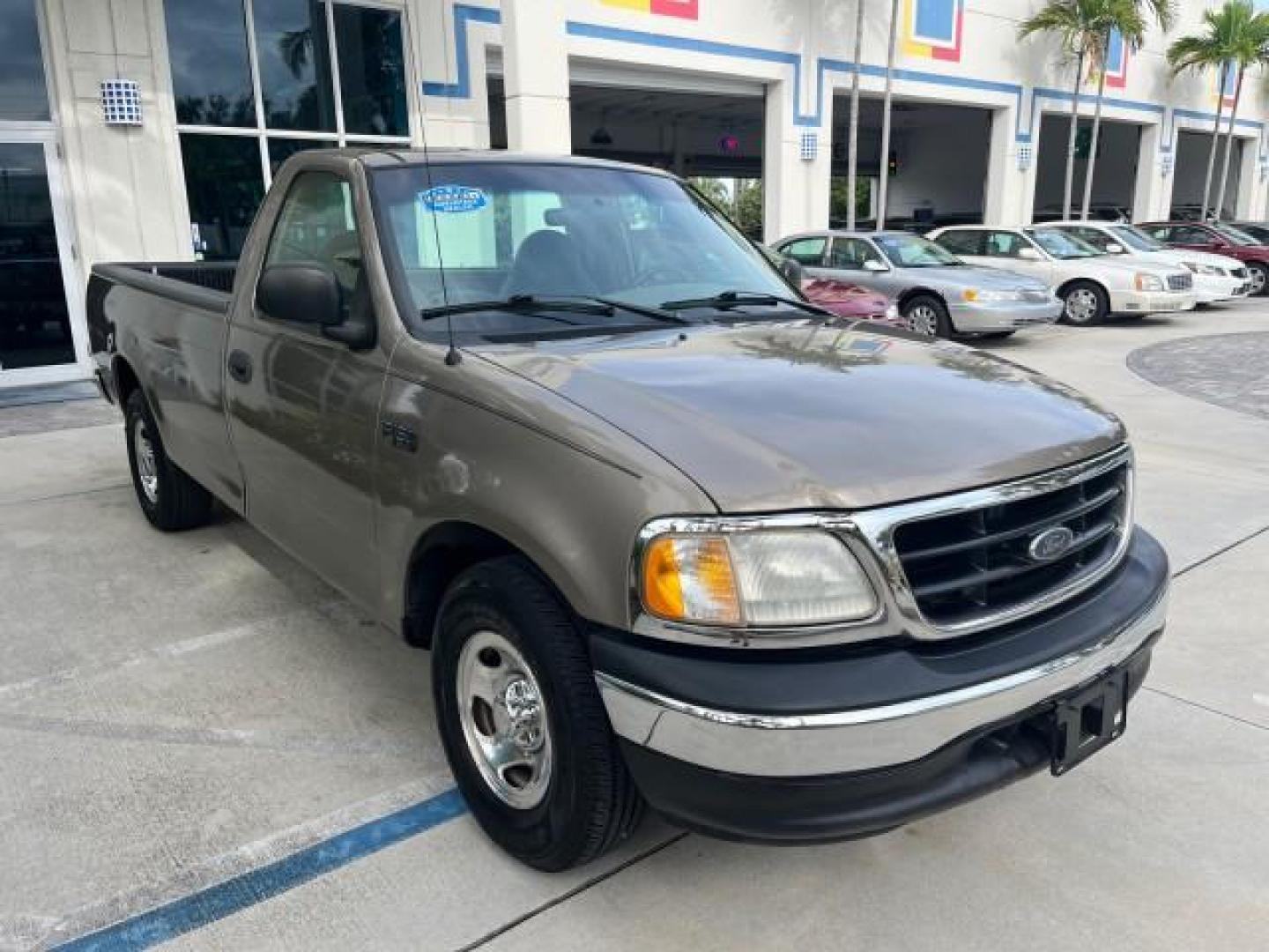 2001 Arizona Beige Metallic /Medium Graphite Ford F-150 XL PU LOW MILES 71,934 (1FTZF17251N) with an 4.2L SEFI V6 Engine engine, Automatic transmission, located at 4701 North Dixie Hwy, Pompano Beach, FL, 33064, (954) 422-2889, 26.240938, -80.123474 - OUR WEBPAGE FLORIDACARS1.COM HAS OVER 100 PHOTOS AND FREE CARFAX LINK 2001 FORD F-150 XL ROAD READY WORK READY PICKUP NO ACCIDENTS 4.2L V6 4.2L V6 F SOHC AUTO AC LOW MILES 71,934 GASOLINE 8 SERVICE RECORDS REAR WHEEL DRIVE 8.1 FT BED LENGTH XL Anti-Theft System Approach Lights RWD THIS IS ONE OF THE - Photo#67