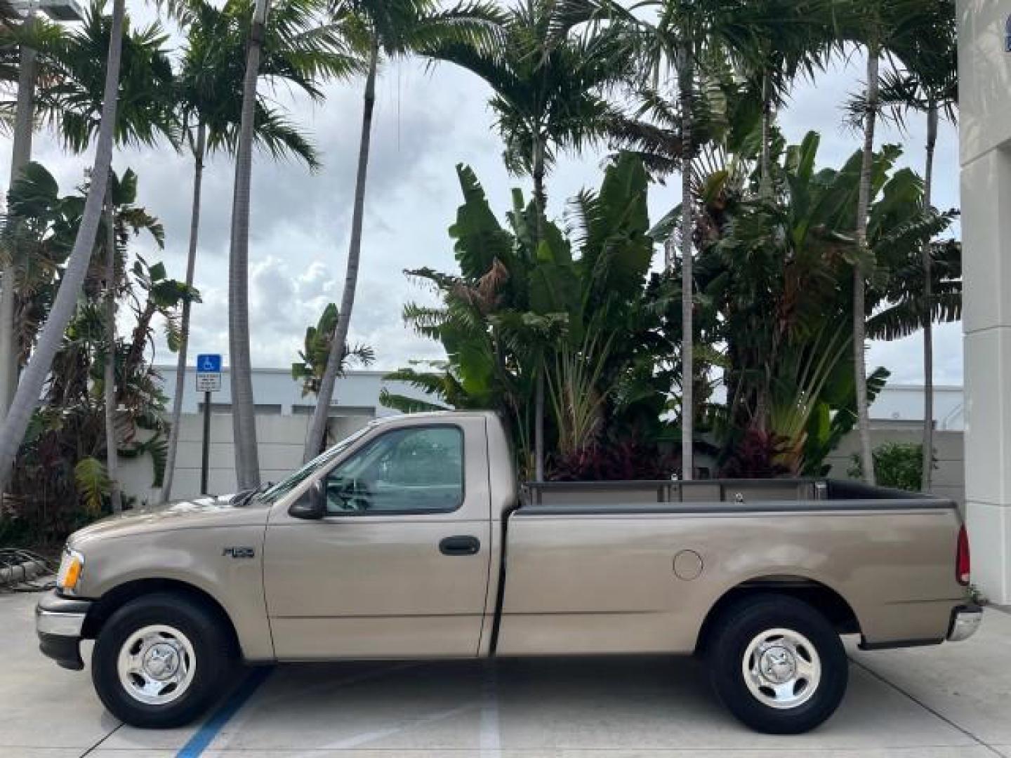 2001 Arizona Beige Metallic /Medium Graphite Ford F-150 XL PU LOW MILES 71,934 (1FTZF17251N) with an 4.2L SEFI V6 Engine engine, Automatic transmission, located at 4701 North Dixie Hwy, Pompano Beach, FL, 33064, (954) 422-2889, 26.240938, -80.123474 - OUR WEBPAGE FLORIDACARS1.COM HAS OVER 100 PHOTOS AND FREE CARFAX LINK 2001 FORD F-150 XL ROAD READY WORK READY PICKUP NO ACCIDENTS 4.2L V6 4.2L V6 F SOHC AUTO AC LOW MILES 71,934 GASOLINE 8 SERVICE RECORDS REAR WHEEL DRIVE 8.1 FT BED LENGTH XL Anti-Theft System Approach Lights RWD THIS IS ONE OF THE - Photo#91