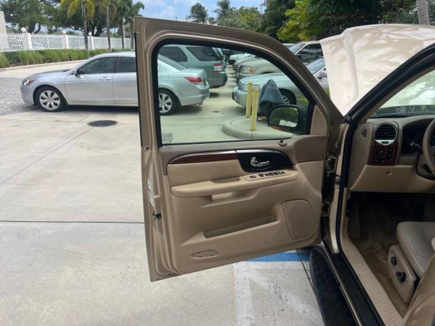 2004 Sand Beige Metallic /Light Tan GMC Envoy 4WD SLE LOW MILES 85,903 (1GKDT13S442) with an 4.2L Vortec 4200 SFI I6 Engine engine, Automatic transmission, located at 4701 North Dixie Hwy, Pompano Beach, FL, 33064, (954) 422-2889, 26.240938, -80.123474 - OUR WEBPAGE FLORIDACARS1.COM HAS OVER 100 PHOTOS AND FREE CARFAX LINK 2004 GMC ENVOY SLE ROAD READY 4.2L V6 VIN: 1GKDT13S442273596 NO ACCIDENTS AWD DOOR WAGON/SPORT UTILITY NO RECALLS 4X4 4.2L V6 F POWER LEATHER SEATS GASOLINE LOW MILES 85,903 POWER SUNROOF REAR WHEEL DRIVE W/ 4X4 ON DEMAND AWD 34 S - Photo#9