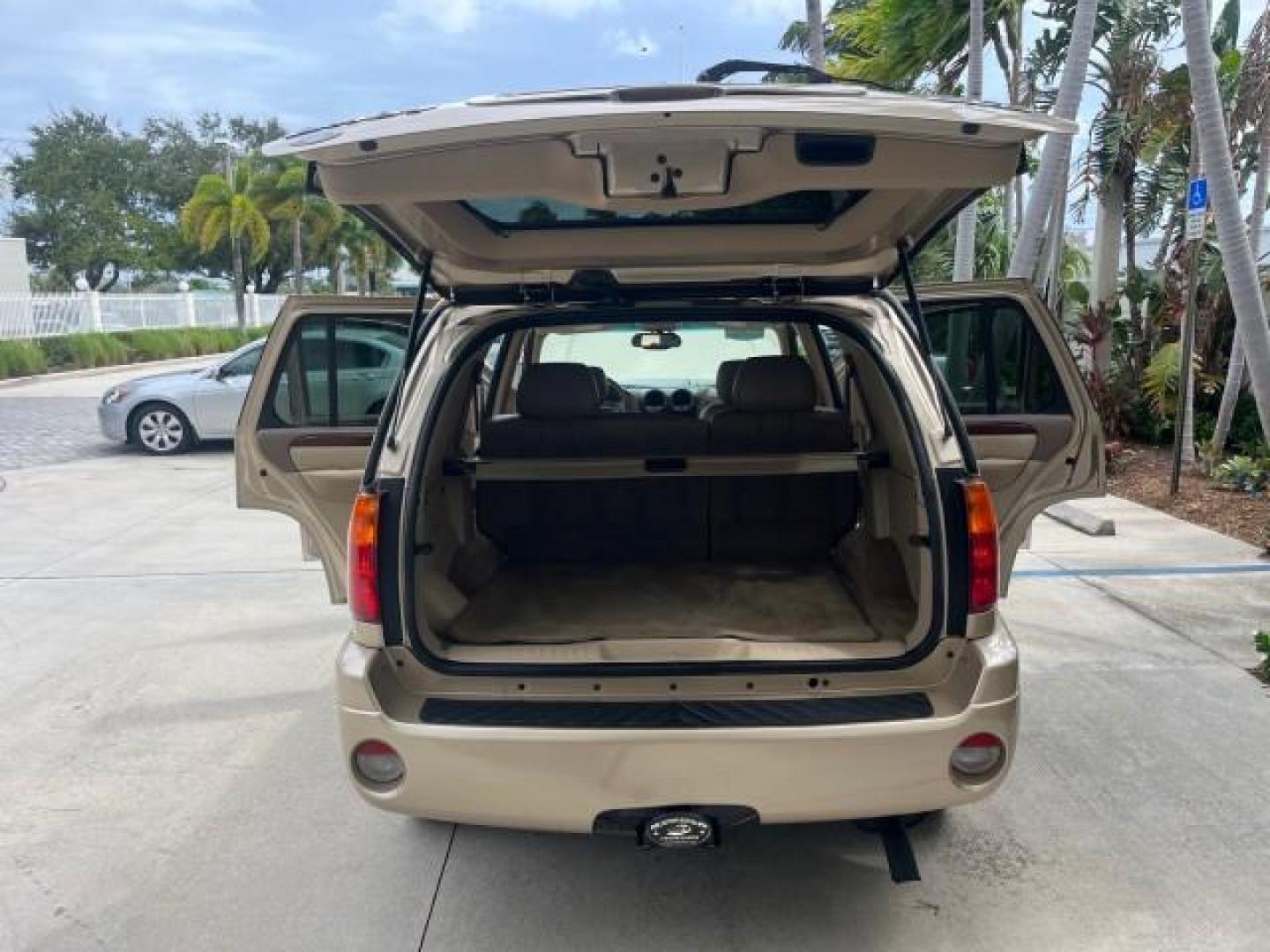 2004 Sand Beige Metallic /Light Tan GMC Envoy 4WD SLE LOW MILES 85,903 (1GKDT13S442) with an 4.2L Vortec 4200 SFI I6 Engine engine, Automatic transmission, located at 4701 North Dixie Hwy, Pompano Beach, FL, 33064, (954) 422-2889, 26.240938, -80.123474 - OUR WEBPAGE FLORIDACARS1.COM HAS OVER 100 PHOTOS AND FREE CARFAX LINK 2004 GMC ENVOY SLE ROAD READY 4.2L V6 VIN: 1GKDT13S442273596 NO ACCIDENTS AWD DOOR WAGON/SPORT UTILITY NO RECALLS 4X4 4.2L V6 F POWER LEATHER SEATS GASOLINE LOW MILES 85,903 POWER SUNROOF REAR WHEEL DRIVE W/ 4X4 ON DEMAND AWD 34 S - Photo#15