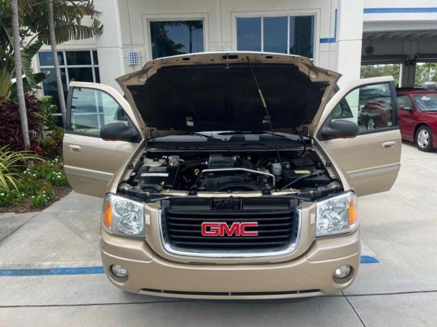 2004 Sand Beige Metallic /Light Tan GMC Envoy 4WD SLE LOW MILES 85,903 (1GKDT13S442) with an 4.2L Vortec 4200 SFI I6 Engine engine, Automatic transmission, located at 4701 North Dixie Hwy, Pompano Beach, FL, 33064, (954) 422-2889, 26.240938, -80.123474 - OUR WEBPAGE FLORIDACARS1.COM HAS OVER 100 PHOTOS AND FREE CARFAX LINK 2004 GMC ENVOY SLE ROAD READY 4.2L V6 VIN: 1GKDT13S442273596 NO ACCIDENTS AWD DOOR WAGON/SPORT UTILITY NO RECALLS 4X4 4.2L V6 F POWER LEATHER SEATS GASOLINE LOW MILES 85,903 POWER SUNROOF REAR WHEEL DRIVE W/ 4X4 ON DEMAND AWD 34 S - Photo#16