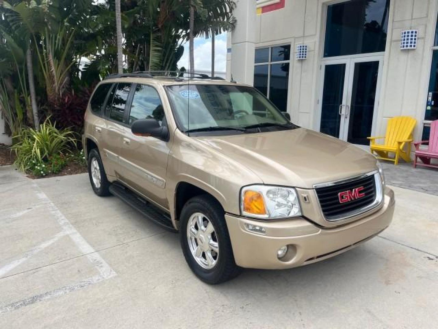 2004 Sand Beige Metallic /Light Tan GMC Envoy 4WD SLE LOW MILES 85,903 (1GKDT13S442) with an 4.2L Vortec 4200 SFI I6 Engine engine, Automatic transmission, located at 4701 North Dixie Hwy, Pompano Beach, FL, 33064, (954) 422-2889, 26.240938, -80.123474 - OUR WEBPAGE FLORIDACARS1.COM HAS OVER 100 PHOTOS AND FREE CARFAX LINK 2004 GMC ENVOY SLE ROAD READY 4.2L V6 VIN: 1GKDT13S442273596 NO ACCIDENTS AWD DOOR WAGON/SPORT UTILITY NO RECALLS 4X4 4.2L V6 F POWER LEATHER SEATS GASOLINE LOW MILES 85,903 POWER SUNROOF REAR WHEEL DRIVE W/ 4X4 ON DEMAND AWD 34 S - Photo#1