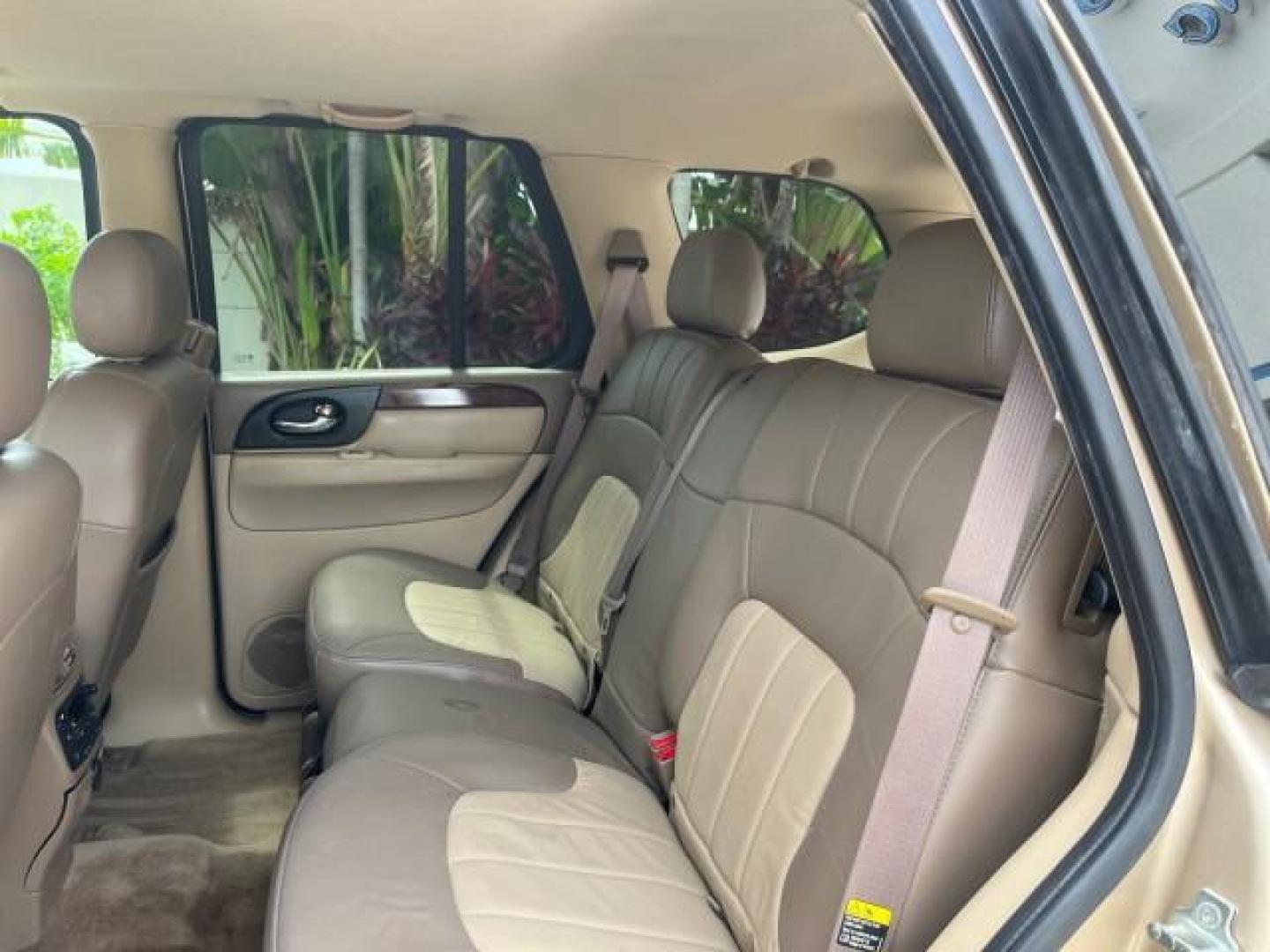 2004 Sand Beige Metallic /Light Tan GMC Envoy 4WD SLE LOW MILES 85,903 (1GKDT13S442) with an 4.2L Vortec 4200 SFI I6 Engine engine, Automatic transmission, located at 4701 North Dixie Hwy, Pompano Beach, FL, 33064, (954) 422-2889, 26.240938, -80.123474 - OUR WEBPAGE FLORIDACARS1.COM HAS OVER 100 PHOTOS AND FREE CARFAX LINK 2004 GMC ENVOY SLE ROAD READY 4.2L V6 VIN: 1GKDT13S442273596 NO ACCIDENTS AWD DOOR WAGON/SPORT UTILITY NO RECALLS 4X4 4.2L V6 F POWER LEATHER SEATS GASOLINE LOW MILES 85,903 POWER SUNROOF REAR WHEEL DRIVE W/ 4X4 ON DEMAND AWD 34 S - Photo#40