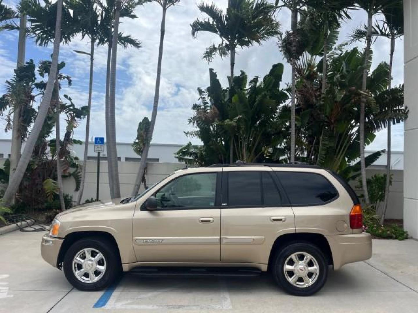 2004 Sand Beige Metallic /Light Tan GMC Envoy 4WD SLE LOW MILES 85,903 (1GKDT13S442) with an 4.2L Vortec 4200 SFI I6 Engine engine, Automatic transmission, located at 4701 North Dixie Hwy, Pompano Beach, FL, 33064, (954) 422-2889, 26.240938, -80.123474 - OUR WEBPAGE FLORIDACARS1.COM HAS OVER 100 PHOTOS AND FREE CARFAX LINK 2004 GMC ENVOY SLE ROAD READY 4.2L V6 VIN: 1GKDT13S442273596 NO ACCIDENTS AWD DOOR WAGON/SPORT UTILITY NO RECALLS 4X4 4.2L V6 F POWER LEATHER SEATS GASOLINE LOW MILES 85,903 POWER SUNROOF REAR WHEEL DRIVE W/ 4X4 ON DEMAND AWD 34 S - Photo#4