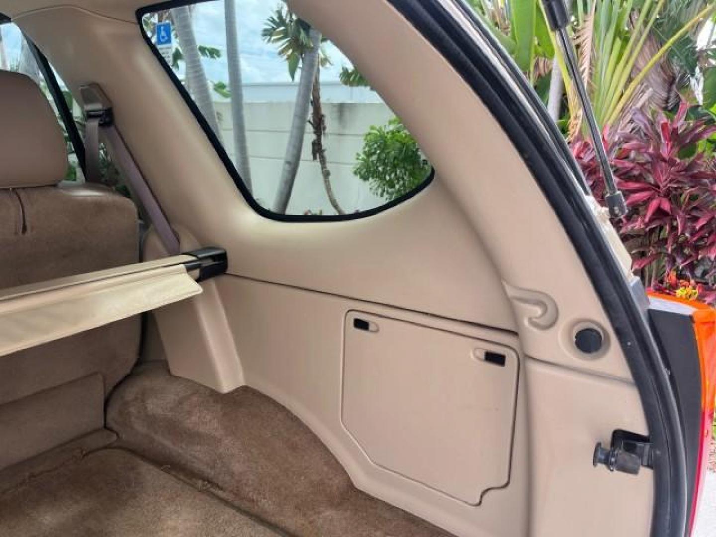 2004 Sand Beige Metallic /Light Tan GMC Envoy 4WD SLE LOW MILES 85,903 (1GKDT13S442) with an 4.2L Vortec 4200 SFI I6 Engine engine, Automatic transmission, located at 4701 North Dixie Hwy, Pompano Beach, FL, 33064, (954) 422-2889, 26.240938, -80.123474 - OUR WEBPAGE FLORIDACARS1.COM HAS OVER 100 PHOTOS AND FREE CARFAX LINK 2004 GMC ENVOY SLE ROAD READY 4.2L V6 VIN: 1GKDT13S442273596 NO ACCIDENTS AWD DOOR WAGON/SPORT UTILITY NO RECALLS 4X4 4.2L V6 F POWER LEATHER SEATS GASOLINE LOW MILES 85,903 POWER SUNROOF REAR WHEEL DRIVE W/ 4X4 ON DEMAND AWD 34 S - Photo#69