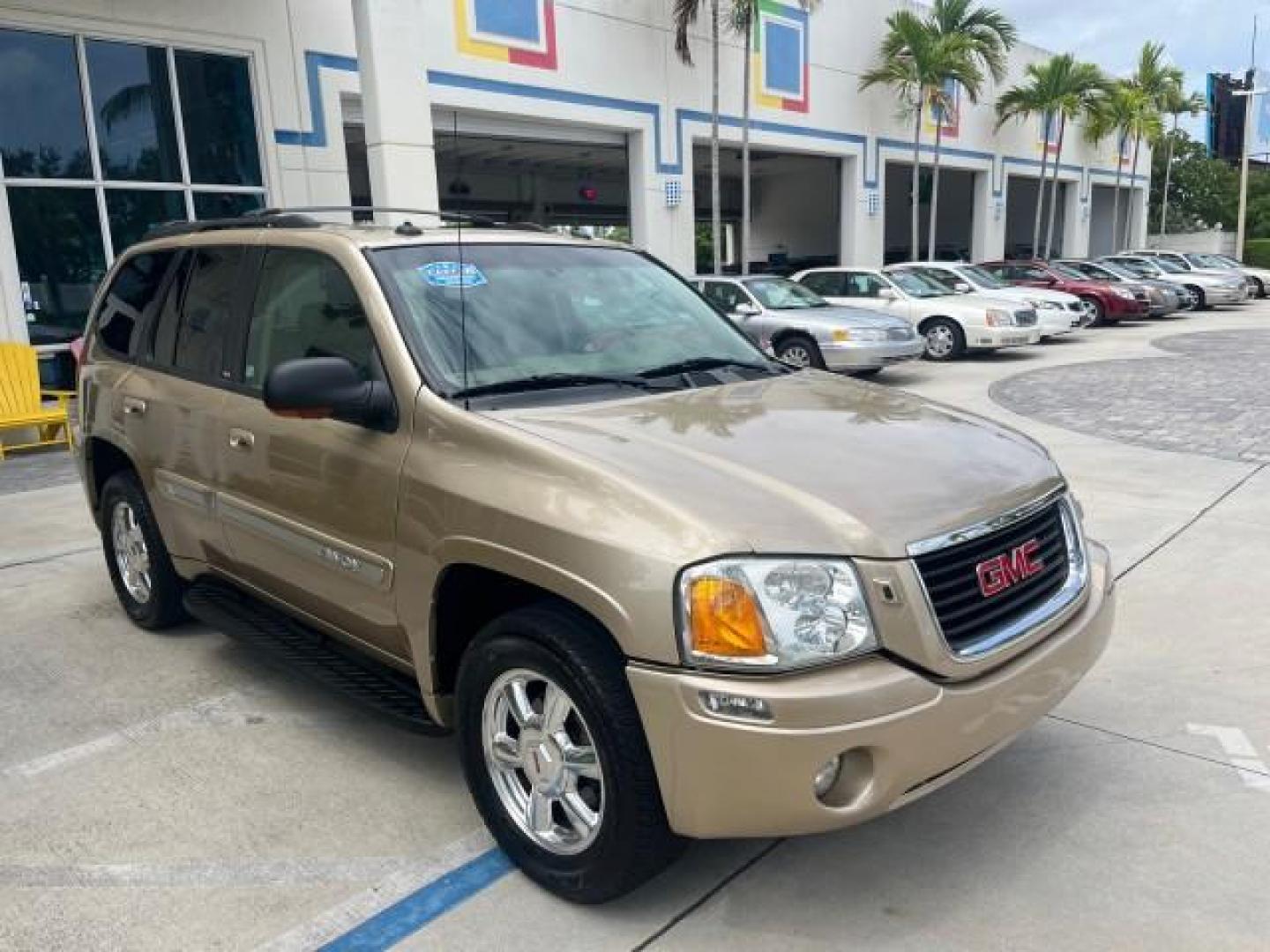 2004 Sand Beige Metallic /Light Tan GMC Envoy 4WD SLE LOW MILES 85,903 (1GKDT13S442) with an 4.2L Vortec 4200 SFI I6 Engine engine, Automatic transmission, located at 4701 North Dixie Hwy, Pompano Beach, FL, 33064, (954) 422-2889, 26.240938, -80.123474 - OUR WEBPAGE FLORIDACARS1.COM HAS OVER 100 PHOTOS AND FREE CARFAX LINK 2004 GMC ENVOY SLE ROAD READY 4.2L V6 VIN: 1GKDT13S442273596 NO ACCIDENTS AWD DOOR WAGON/SPORT UTILITY NO RECALLS 4X4 4.2L V6 F POWER LEATHER SEATS GASOLINE LOW MILES 85,903 POWER SUNROOF REAR WHEEL DRIVE W/ 4X4 ON DEMAND AWD 34 S - Photo#77