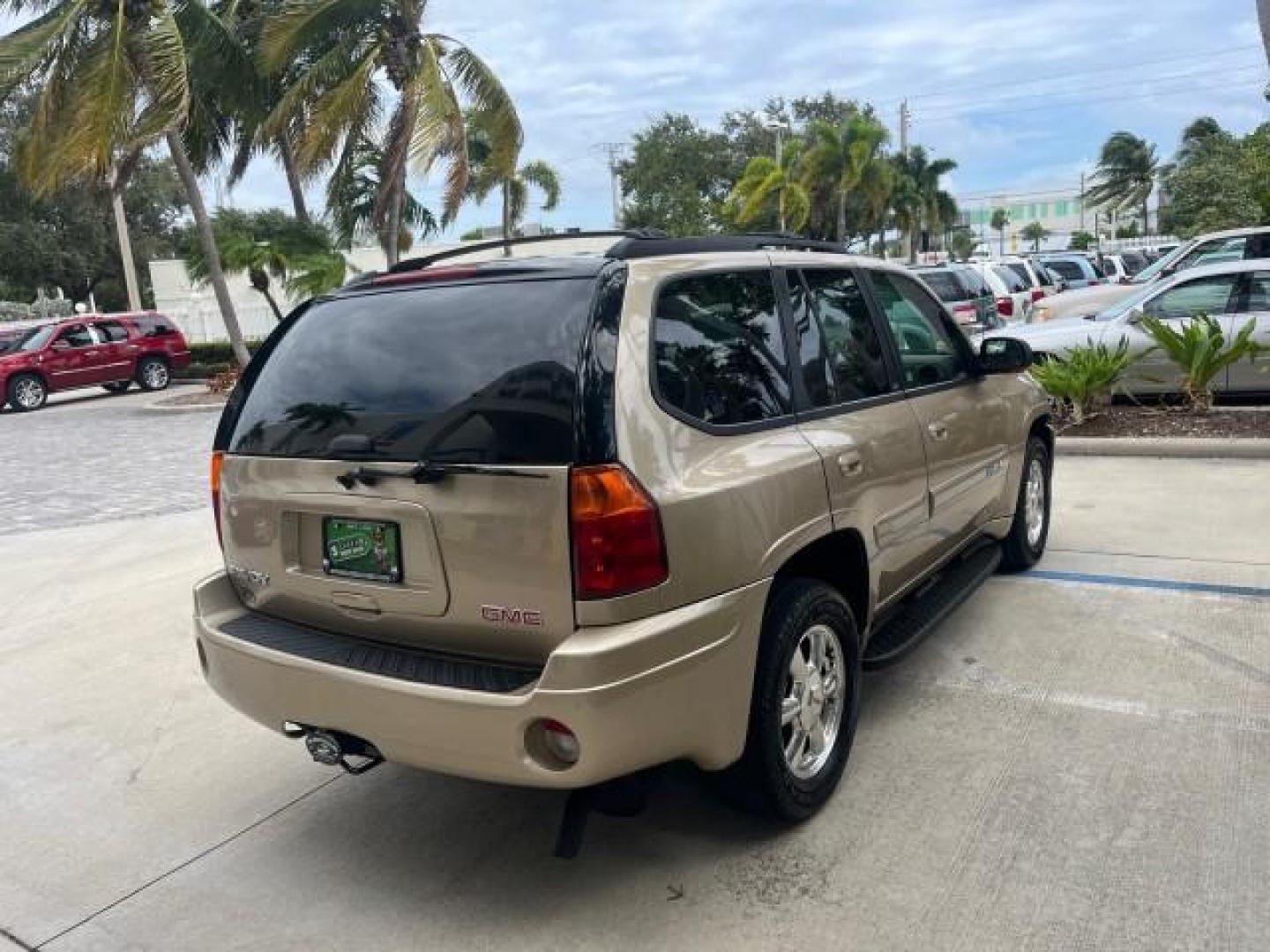 2004 Sand Beige Metallic /Light Tan GMC Envoy 4WD SLE LOW MILES 85,903 (1GKDT13S442) with an 4.2L Vortec 4200 SFI I6 Engine engine, Automatic transmission, located at 4701 North Dixie Hwy, Pompano Beach, FL, 33064, (954) 422-2889, 26.240938, -80.123474 - OUR WEBPAGE FLORIDACARS1.COM HAS OVER 100 PHOTOS AND FREE CARFAX LINK 2004 GMC ENVOY SLE ROAD READY 4.2L V6 VIN: 1GKDT13S442273596 NO ACCIDENTS AWD DOOR WAGON/SPORT UTILITY NO RECALLS 4X4 4.2L V6 F POWER LEATHER SEATS GASOLINE LOW MILES 85,903 POWER SUNROOF REAR WHEEL DRIVE W/ 4X4 ON DEMAND AWD 34 S - Photo#7