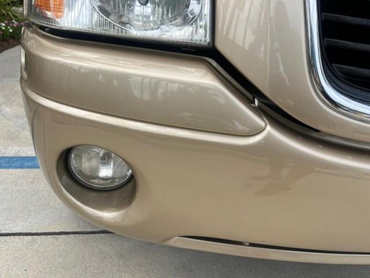 2004 Sand Beige Metallic /Light Tan GMC Envoy 4WD SLE LOW MILES 85,903 (1GKDT13S442) with an 4.2L Vortec 4200 SFI I6 Engine engine, Automatic transmission, located at 4701 North Dixie Hwy, Pompano Beach, FL, 33064, (954) 422-2889, 26.240938, -80.123474 - OUR WEBPAGE FLORIDACARS1.COM HAS OVER 100 PHOTOS AND FREE CARFAX LINK 2004 GMC ENVOY SLE ROAD READY 4.2L V6 VIN: 1GKDT13S442273596 NO ACCIDENTS AWD DOOR WAGON/SPORT UTILITY NO RECALLS 4X4 4.2L V6 F POWER LEATHER SEATS GASOLINE LOW MILES 85,903 POWER SUNROOF REAR WHEEL DRIVE W/ 4X4 ON DEMAND AWD 34 S - Photo#81