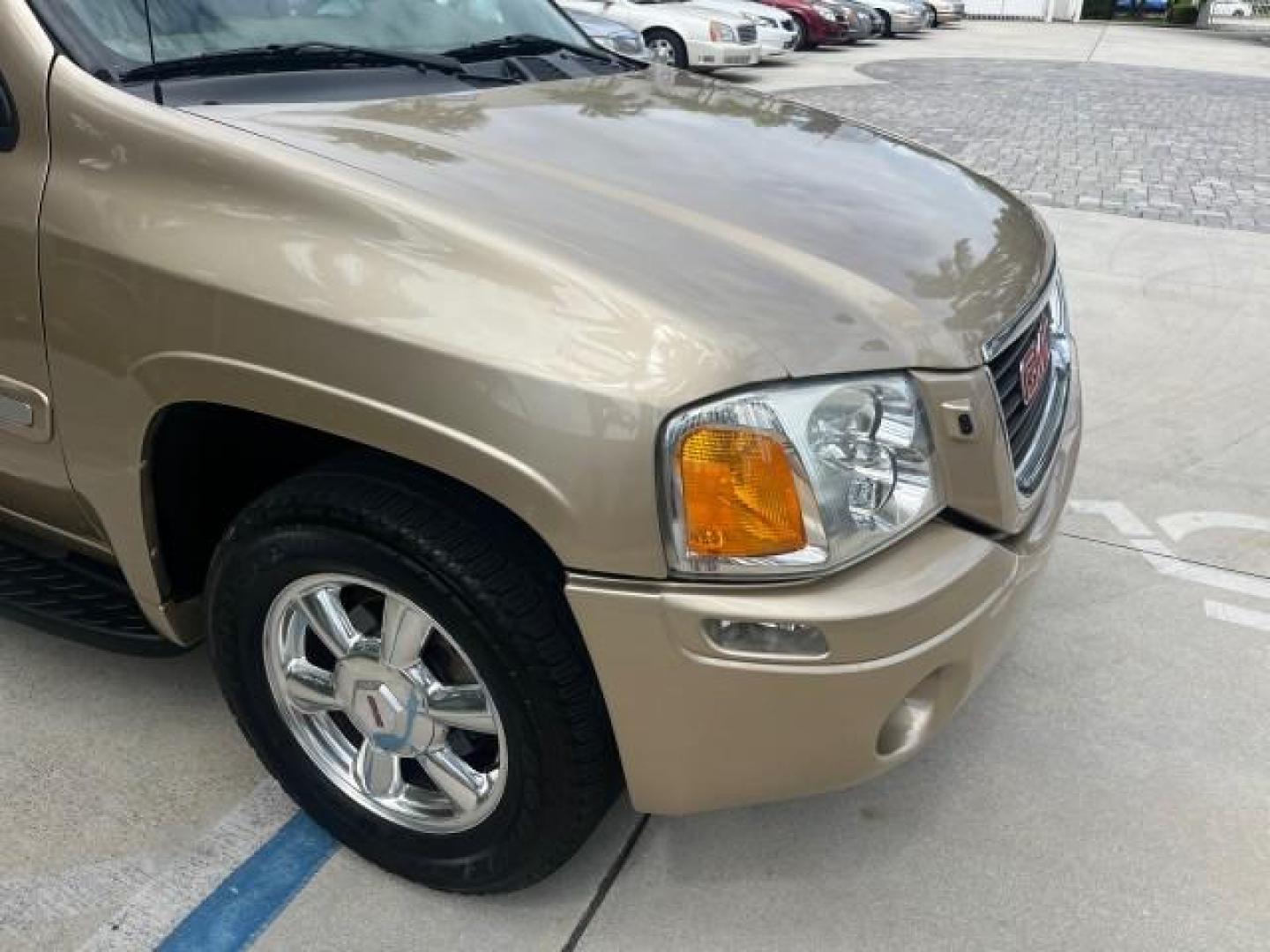 2004 Sand Beige Metallic /Light Tan GMC Envoy 4WD SLE LOW MILES 85,903 (1GKDT13S442) with an 4.2L Vortec 4200 SFI I6 Engine engine, Automatic transmission, located at 4701 North Dixie Hwy, Pompano Beach, FL, 33064, (954) 422-2889, 26.240938, -80.123474 - OUR WEBPAGE FLORIDACARS1.COM HAS OVER 100 PHOTOS AND FREE CARFAX LINK 2004 GMC ENVOY SLE ROAD READY 4.2L V6 VIN: 1GKDT13S442273596 NO ACCIDENTS AWD DOOR WAGON/SPORT UTILITY NO RECALLS 4X4 4.2L V6 F POWER LEATHER SEATS GASOLINE LOW MILES 85,903 POWER SUNROOF REAR WHEEL DRIVE W/ 4X4 ON DEMAND AWD 34 S - Photo#88