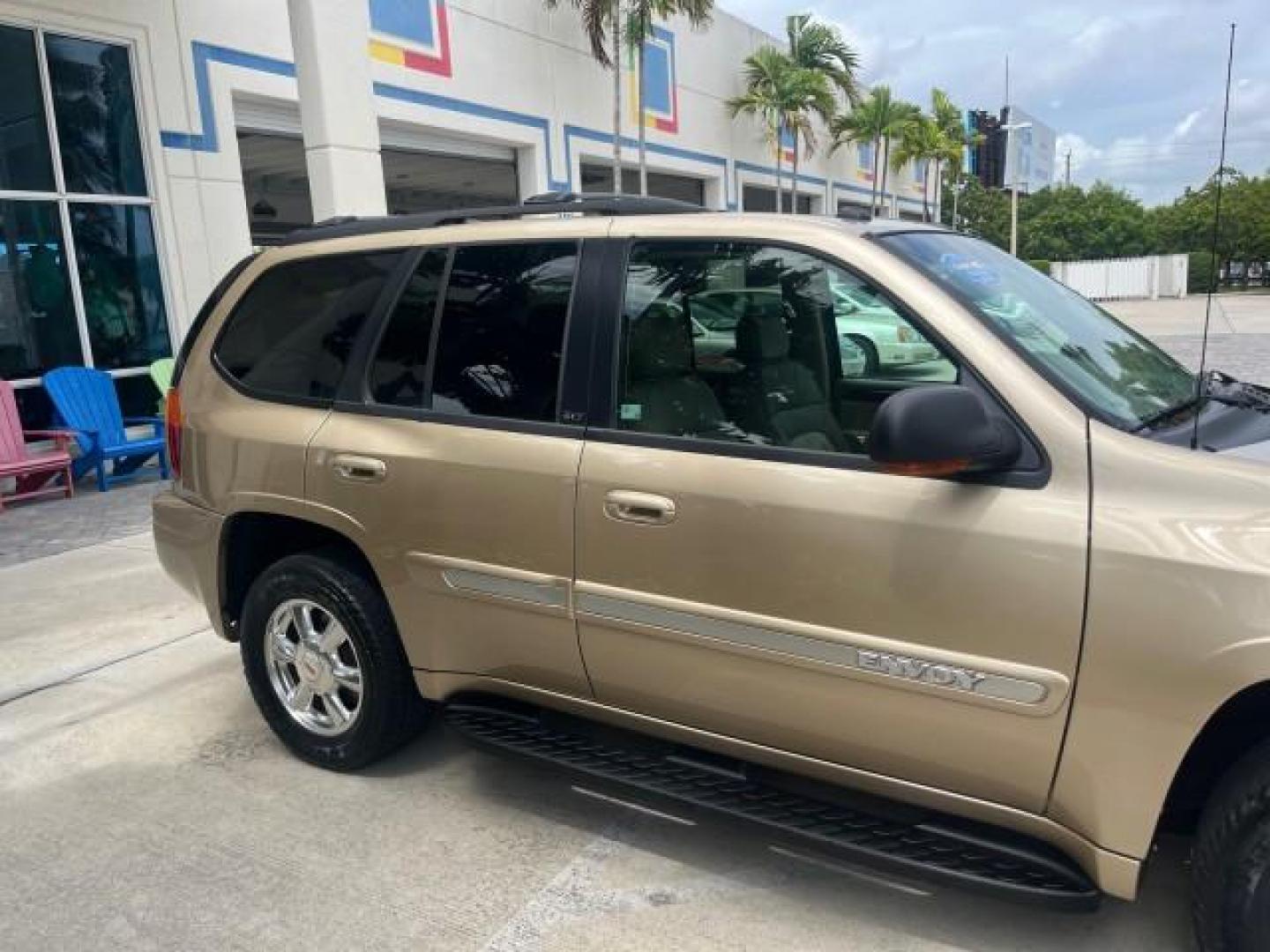 2004 Sand Beige Metallic /Light Tan GMC Envoy 4WD SLE LOW MILES 85,903 (1GKDT13S442) with an 4.2L Vortec 4200 SFI I6 Engine engine, Automatic transmission, located at 4701 North Dixie Hwy, Pompano Beach, FL, 33064, (954) 422-2889, 26.240938, -80.123474 - OUR WEBPAGE FLORIDACARS1.COM HAS OVER 100 PHOTOS AND FREE CARFAX LINK 2004 GMC ENVOY SLE ROAD READY 4.2L V6 VIN: 1GKDT13S442273596 NO ACCIDENTS AWD DOOR WAGON/SPORT UTILITY NO RECALLS 4X4 4.2L V6 F POWER LEATHER SEATS GASOLINE LOW MILES 85,903 POWER SUNROOF REAR WHEEL DRIVE W/ 4X4 ON DEMAND AWD 34 S - Photo#90