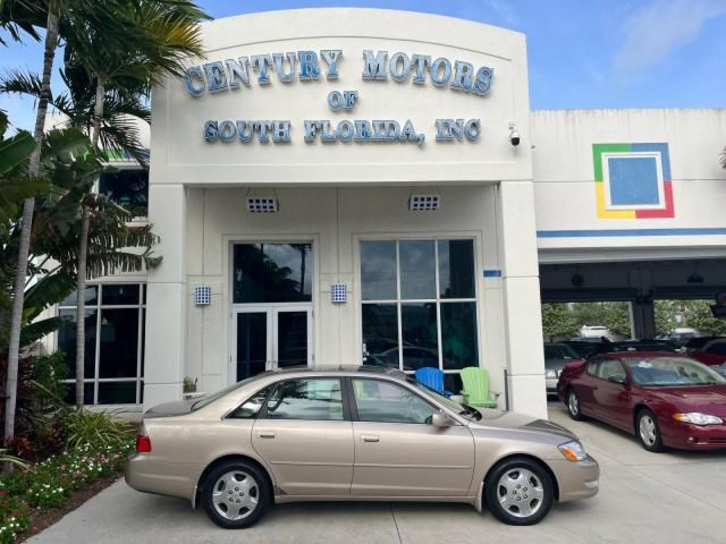 2003 Desert Sand Mica /Ivory Toyota Avalon XLS LOW MILES 72,511 (4T1BF28B73U) with an 3.0L DOHC MPFI 24-Valve V6 Engine engine, Automatic transmission, located at 4701 North Dixie Hwy, Pompano Beach, FL, 33064, (954) 422-2889, 26.240938, -80.123474 - OUR WEBPAGE FLORIDACARS1.COM HAS OVER 100 PHOTOS AND FREE CARFAX LINK 2003 TOYOTA AVALON XLS ROAD READY 3.0L V6 VIN: 4T1BF28B73U304119 NO RECALLS 29 MPG SEDAN 4 DR FLORIDA OWNER 3.0L V6 F DOHC 24V LOW MILES 72,511 GASOLINE POWER LEATHER SEATS FRONT WHEEL DRIVE 18 SERVICE RECORDS POWER SUNROOF XLE Al - Photo#0