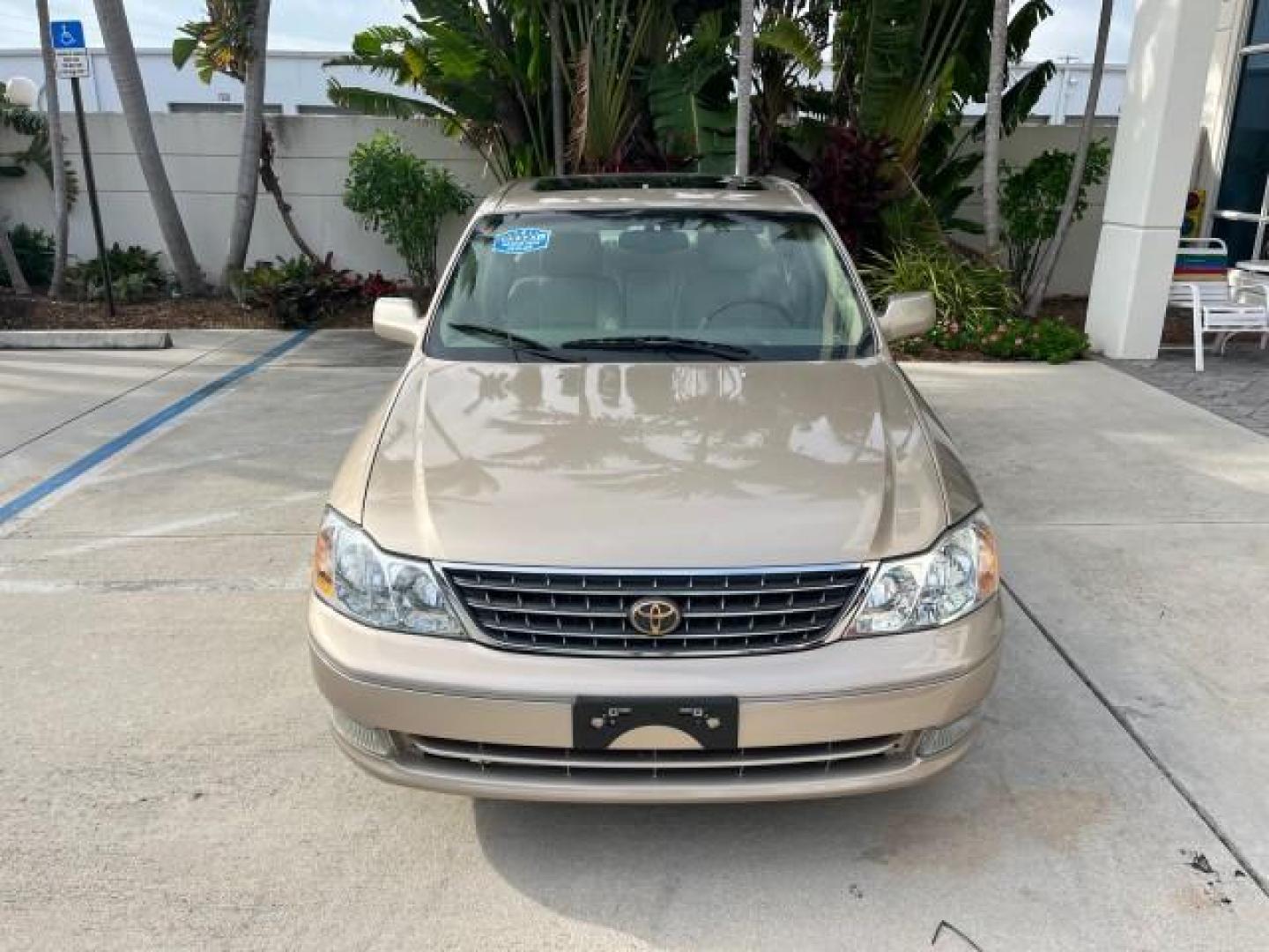 2003 Desert Sand Mica /Ivory Toyota Avalon XLS LOW MILES 72,511 (4T1BF28B73U) with an 3.0L DOHC MPFI 24-Valve V6 Engine engine, Automatic transmission, located at 4701 North Dixie Hwy, Pompano Beach, FL, 33064, (954) 422-2889, 26.240938, -80.123474 - OUR WEBPAGE FLORIDACARS1.COM HAS OVER 100 PHOTOS AND FREE CARFAX LINK 2003 TOYOTA AVALON XLS ROAD READY 3.0L V6 VIN: 4T1BF28B73U304119 NO RECALLS 29 MPG SEDAN 4 DR FLORIDA OWNER 3.0L V6 F DOHC 24V LOW MILES 72,511 GASOLINE POWER LEATHER SEATS FRONT WHEEL DRIVE 18 SERVICE RECORDS POWER SUNROOF XLE Al - Photo#2