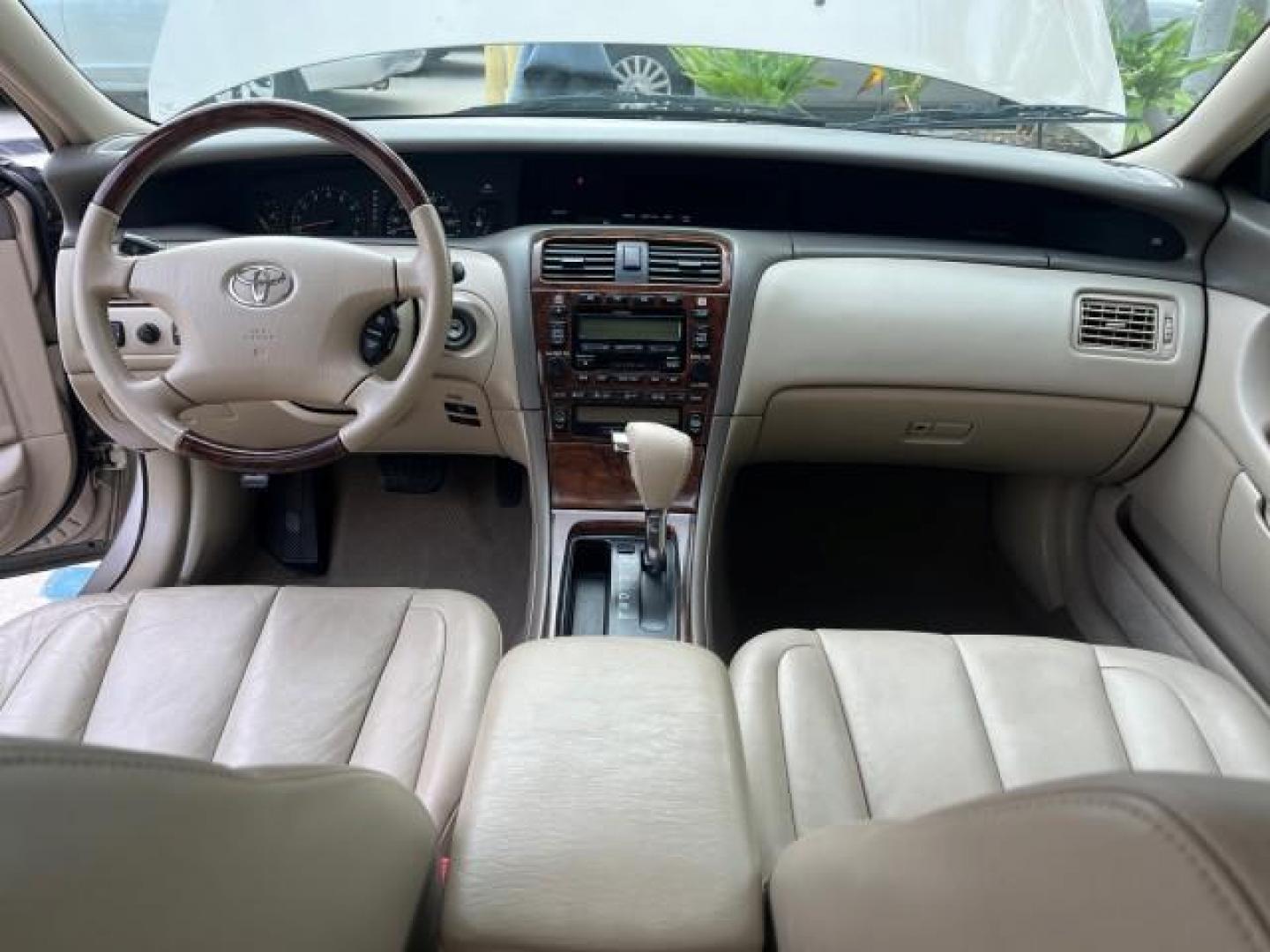 2003 Desert Sand Mica /Ivory Toyota Avalon XLS LOW MILES 72,511 (4T1BF28B73U) with an 3.0L DOHC MPFI 24-Valve V6 Engine engine, Automatic transmission, located at 4701 North Dixie Hwy, Pompano Beach, FL, 33064, (954) 422-2889, 26.240938, -80.123474 - OUR WEBPAGE FLORIDACARS1.COM HAS OVER 100 PHOTOS AND FREE CARFAX LINK 2003 TOYOTA AVALON XLS ROAD READY 3.0L V6 VIN: 4T1BF28B73U304119 NO RECALLS 29 MPG SEDAN 4 DR FLORIDA OWNER 3.0L V6 F DOHC 24V LOW MILES 72,511 GASOLINE POWER LEATHER SEATS FRONT WHEEL DRIVE 18 SERVICE RECORDS POWER SUNROOF XLE Al - Photo#33