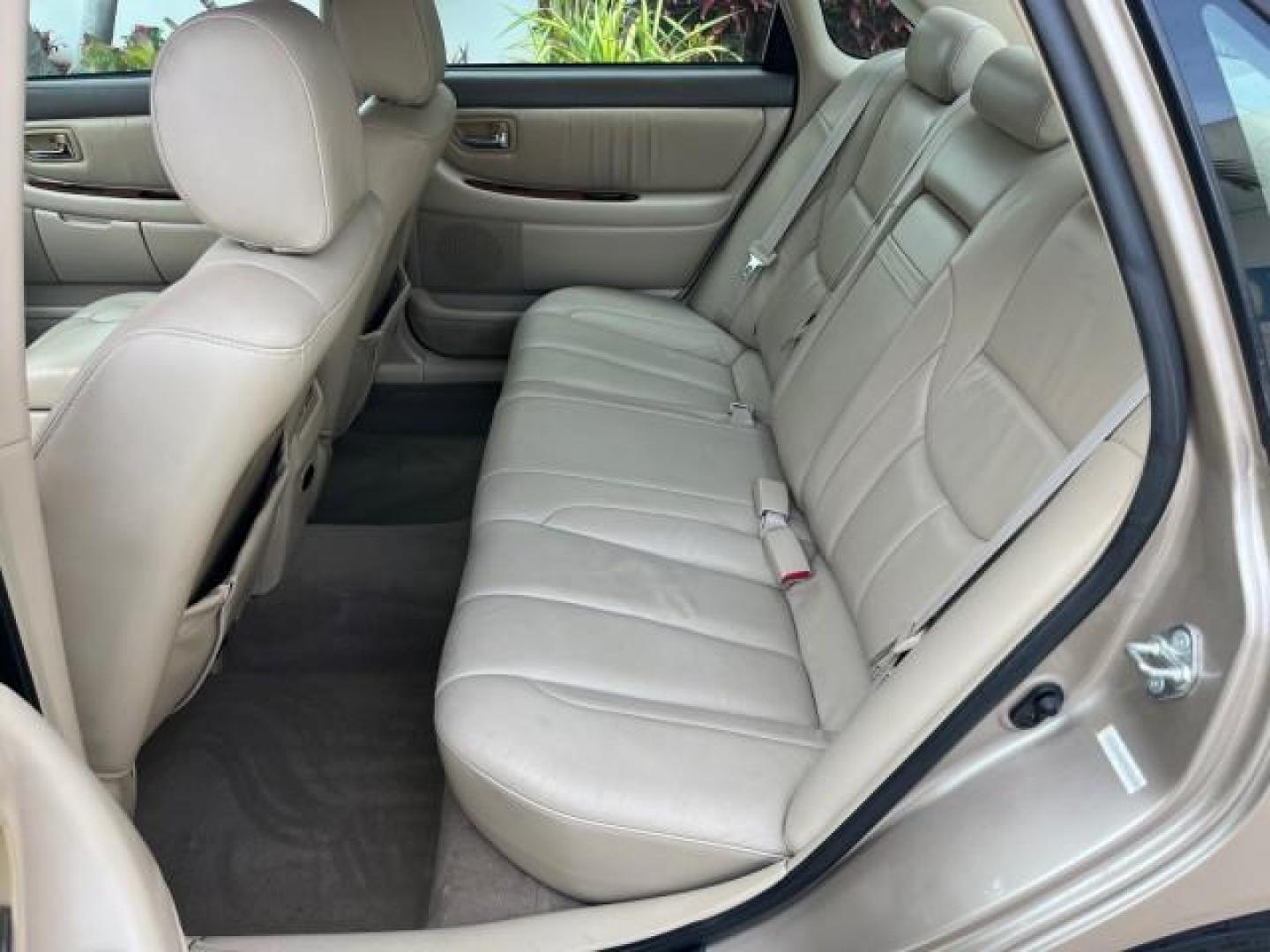 2003 Desert Sand Mica /Ivory Toyota Avalon XLS LOW MILES 72,511 (4T1BF28B73U) with an 3.0L DOHC MPFI 24-Valve V6 Engine engine, Automatic transmission, located at 4701 North Dixie Hwy, Pompano Beach, FL, 33064, (954) 422-2889, 26.240938, -80.123474 - OUR WEBPAGE FLORIDACARS1.COM HAS OVER 100 PHOTOS AND FREE CARFAX LINK 2003 TOYOTA AVALON XLS ROAD READY 3.0L V6 VIN: 4T1BF28B73U304119 NO RECALLS 29 MPG SEDAN 4 DR FLORIDA OWNER 3.0L V6 F DOHC 24V LOW MILES 72,511 GASOLINE POWER LEATHER SEATS FRONT WHEEL DRIVE 18 SERVICE RECORDS POWER SUNROOF XLE Al - Photo#38