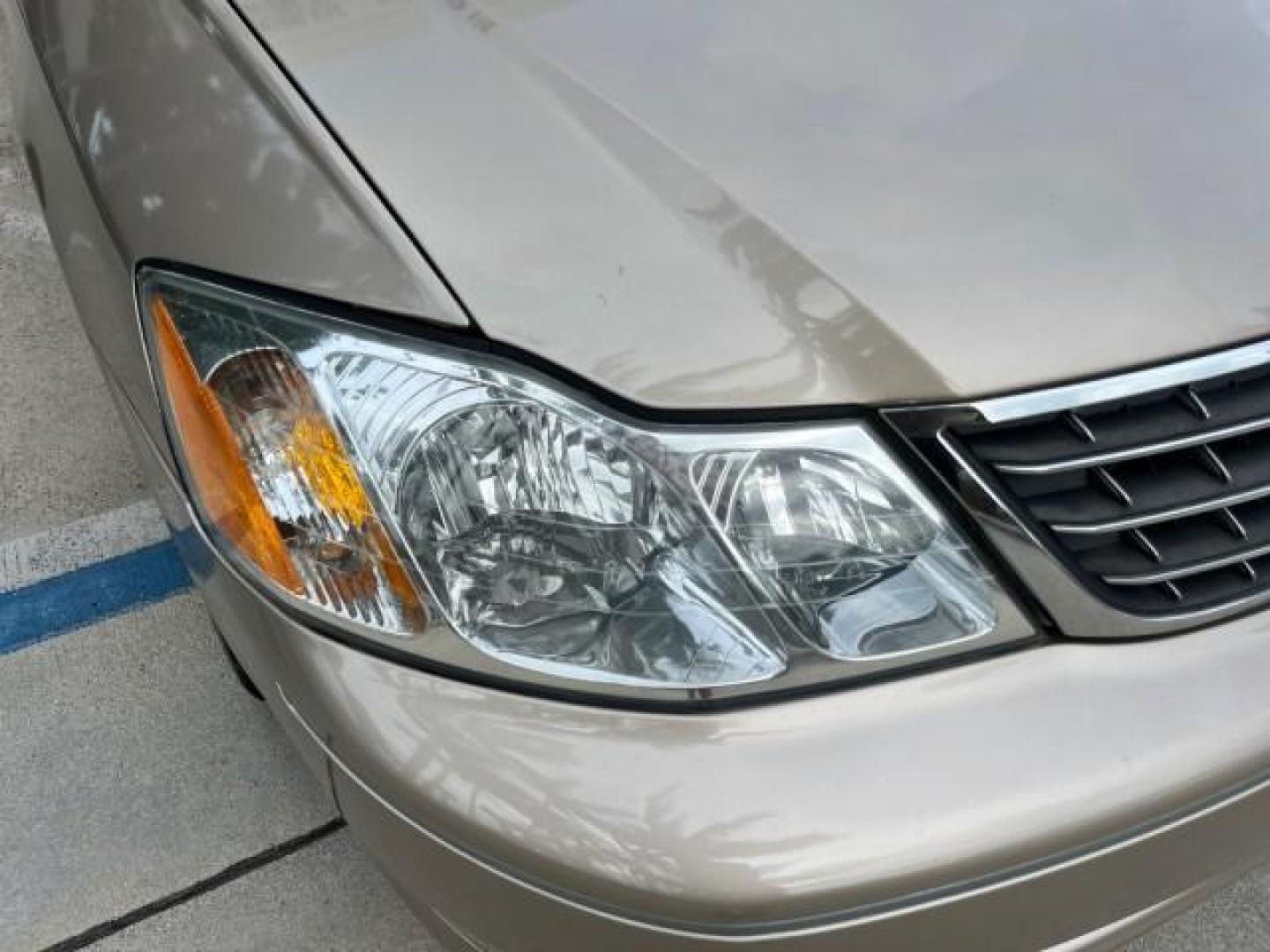 2003 Desert Sand Mica /Ivory Toyota Avalon XLS LOW MILES 72,511 (4T1BF28B73U) with an 3.0L DOHC MPFI 24-Valve V6 Engine engine, Automatic transmission, located at 4701 North Dixie Hwy, Pompano Beach, FL, 33064, (954) 422-2889, 26.240938, -80.123474 - OUR WEBPAGE FLORIDACARS1.COM HAS OVER 100 PHOTOS AND FREE CARFAX LINK 2003 TOYOTA AVALON XLS ROAD READY 3.0L V6 VIN: 4T1BF28B73U304119 NO RECALLS 29 MPG SEDAN 4 DR FLORIDA OWNER 3.0L V6 F DOHC 24V LOW MILES 72,511 GASOLINE POWER LEATHER SEATS FRONT WHEEL DRIVE 18 SERVICE RECORDS POWER SUNROOF XLE Al - Photo#81