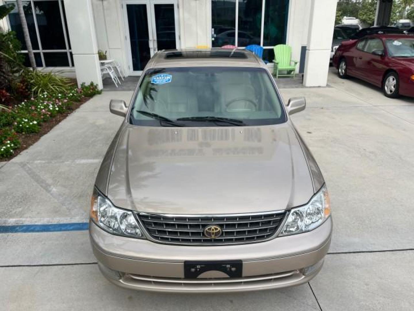 2003 Desert Sand Mica /Ivory Toyota Avalon XLS LOW MILES 72,511 (4T1BF28B73U) with an 3.0L DOHC MPFI 24-Valve V6 Engine engine, Automatic transmission, located at 4701 North Dixie Hwy, Pompano Beach, FL, 33064, (954) 422-2889, 26.240938, -80.123474 - OUR WEBPAGE FLORIDACARS1.COM HAS OVER 100 PHOTOS AND FREE CARFAX LINK 2003 TOYOTA AVALON XLS ROAD READY 3.0L V6 VIN: 4T1BF28B73U304119 NO RECALLS 29 MPG SEDAN 4 DR FLORIDA OWNER 3.0L V6 F DOHC 24V LOW MILES 72,511 GASOLINE POWER LEATHER SEATS FRONT WHEEL DRIVE 18 SERVICE RECORDS POWER SUNROOF XLE Al - Photo#86