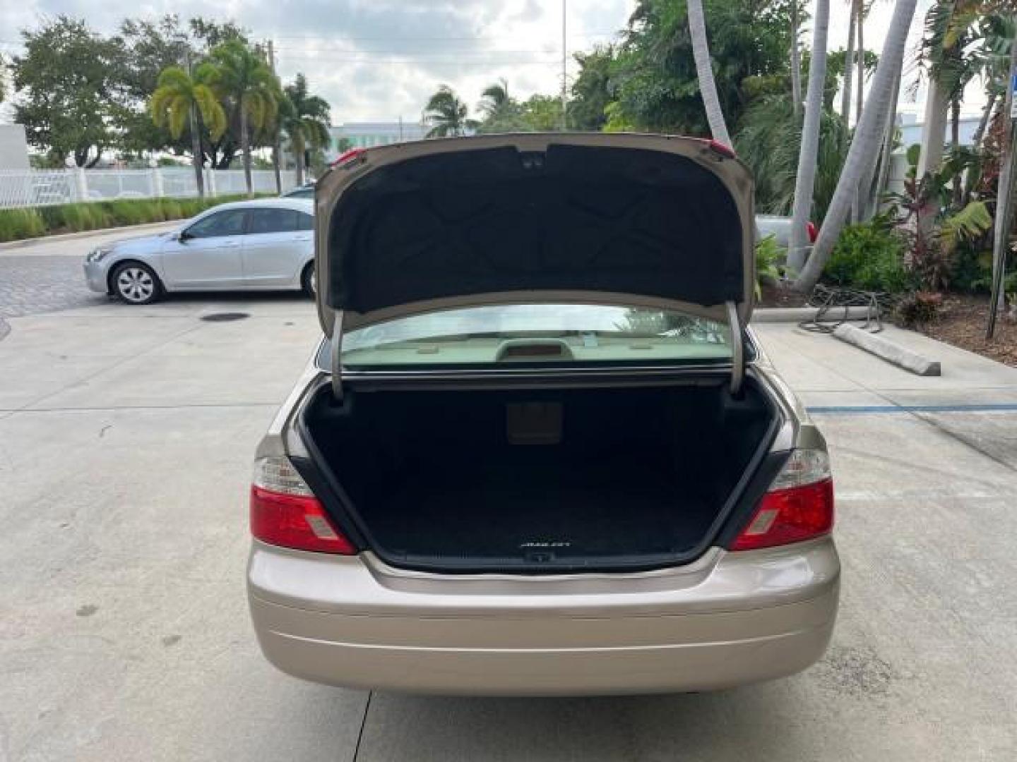 2003 Desert Sand Mica /Ivory Toyota Avalon XLS LOW MILES 72,511 (4T1BF28B73U) with an 3.0L DOHC MPFI 24-Valve V6 Engine engine, Automatic transmission, located at 4701 North Dixie Hwy, Pompano Beach, FL, 33064, (954) 422-2889, 26.240938, -80.123474 - OUR WEBPAGE FLORIDACARS1.COM HAS OVER 100 PHOTOS AND FREE CARFAX LINK 2003 TOYOTA AVALON XLS ROAD READY 3.0L V6 VIN: 4T1BF28B73U304119 NO RECALLS 29 MPG SEDAN 4 DR FLORIDA OWNER 3.0L V6 F DOHC 24V LOW MILES 72,511 GASOLINE POWER LEATHER SEATS FRONT WHEEL DRIVE 18 SERVICE RECORDS POWER SUNROOF XLE Al - Photo#67