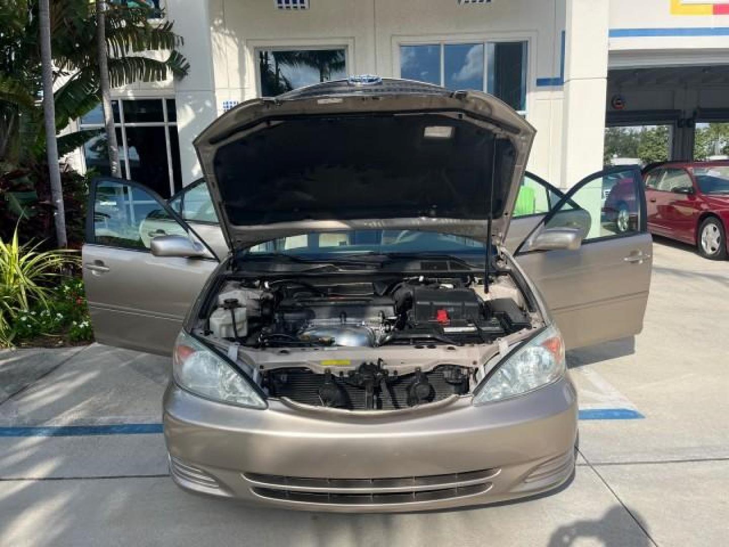 2004 Desert Sand Mica /Stone Toyota Camry 1 FL LE LOW MILES 60,167 (4T1BE32K64U) with an 2.4L DOHC MPFI Vvti 16-Valve 4-Cyl Engine engine, Automatic transmission, located at 4701 North Dixie Hwy, Pompano Beach, FL, 33064, (954) 422-2889, 26.240938, -80.123474 - OUR WEBPAGE FLORIDACARS1.COM HAS OVER 100 PHOTOS AND FREE CARFAX LINK 2004 TOYOTA CAMRY LE ROAD READY 2.4L I4 VIN: 4T1BE32K64U816523 NO ACCIDENTS SEDAN 4 DR NO RECALLS 32 MPG 2.4L I4 F DOHC 16V 1 OWNER FLORIDA GASOLINE LOW MILES 60,167 FRONT WHEEL DRIVE POWER SEATS/MIRRORS Approach Lights Cruise Con - Photo#16