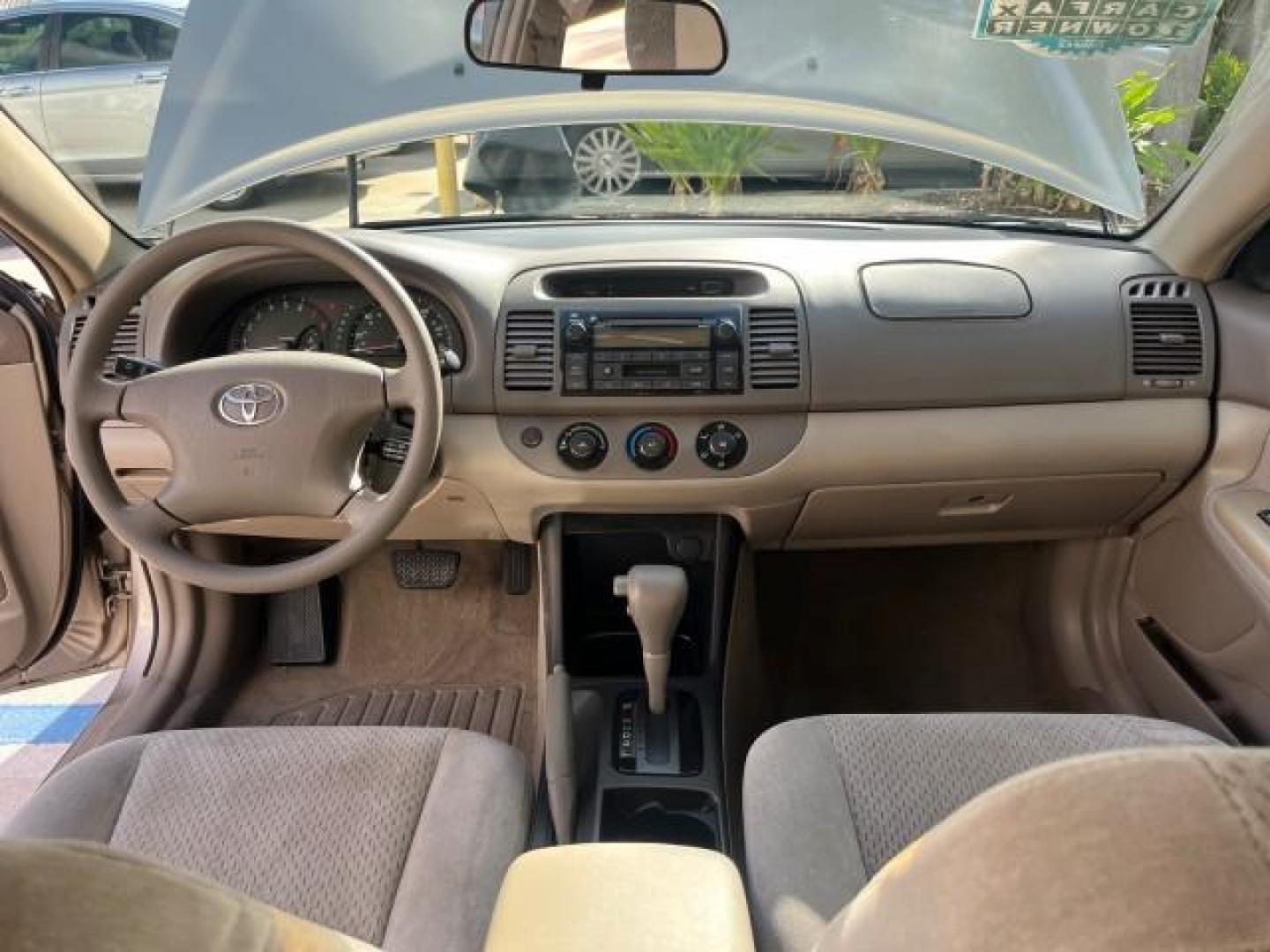 2004 Desert Sand Mica /Stone Toyota Camry 1 FL LE LOW MILES 60,167 (4T1BE32K64U) with an 2.4L DOHC MPFI Vvti 16-Valve 4-Cyl Engine engine, Automatic transmission, located at 4701 North Dixie Hwy, Pompano Beach, FL, 33064, (954) 422-2889, 26.240938, -80.123474 - OUR WEBPAGE FLORIDACARS1.COM HAS OVER 100 PHOTOS AND FREE CARFAX LINK 2004 TOYOTA CAMRY LE ROAD READY 2.4L I4 VIN: 4T1BE32K64U816523 NO ACCIDENTS SEDAN 4 DR NO RECALLS 32 MPG 2.4L I4 F DOHC 16V 1 OWNER FLORIDA GASOLINE LOW MILES 60,167 FRONT WHEEL DRIVE POWER SEATS/MIRRORS Approach Lights Cruise Con - Photo#33