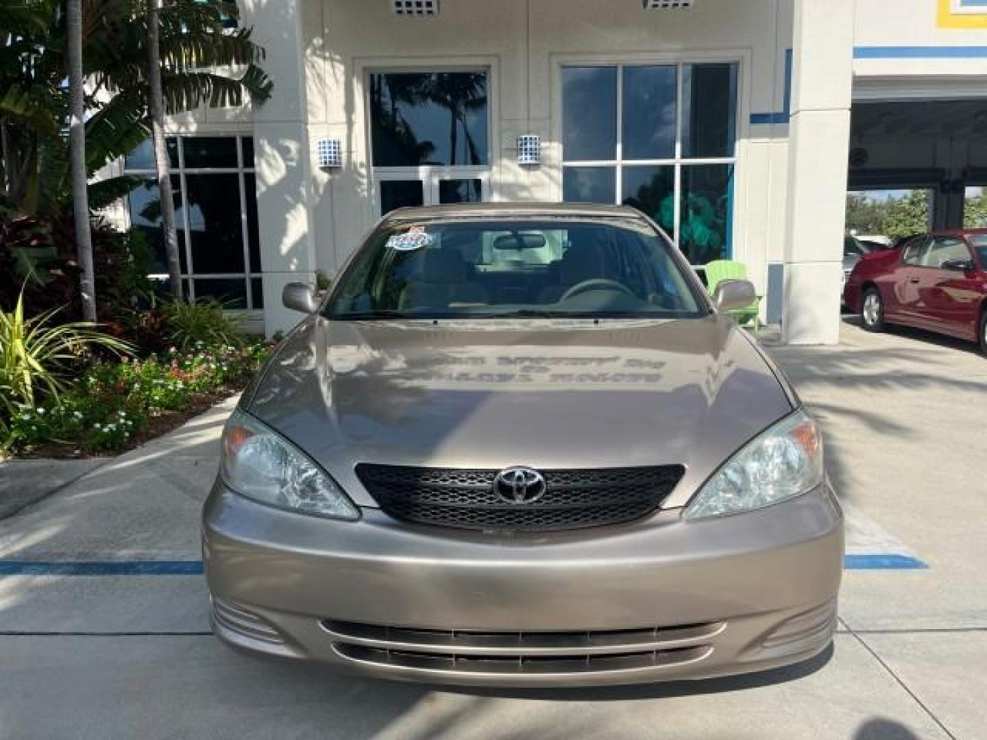 2004 Desert Sand Mica /Stone Toyota Camry 1 FL LE LOW MILES 60,167 (4T1BE32K64U) with an 2.4L DOHC MPFI Vvti 16-Valve 4-Cyl Engine engine, Automatic transmission, located at 4701 North Dixie Hwy, Pompano Beach, FL, 33064, (954) 422-2889, 26.240938, -80.123474 - OUR WEBPAGE FLORIDACARS1.COM HAS OVER 100 PHOTOS AND FREE CARFAX LINK 2004 TOYOTA CAMRY LE ROAD READY 2.4L I4 VIN: 4T1BE32K64U816523 NO ACCIDENTS SEDAN 4 DR NO RECALLS 32 MPG 2.4L I4 F DOHC 16V 1 OWNER FLORIDA GASOLINE LOW MILES 60,167 FRONT WHEEL DRIVE POWER SEATS/MIRRORS Approach Lights Cruise Con - Photo#68