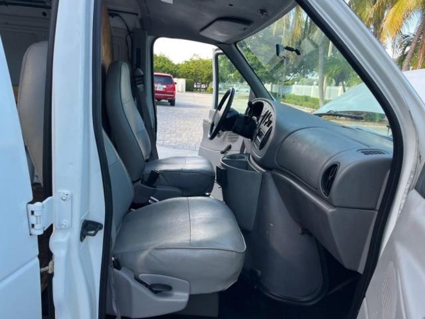 1998 Oxford White (CC) /Medium Graphite Ford Econoline Cargo Van AC LOW MILES 117,724 (1FTPE2427WH) with an 4.2L SEFI SPI V6 Engine engine, Automatic transmission, located at 4701 North Dixie Hwy, Pompano Beach, FL, 33064, (954) 422-2889, 26.240938, -80.123474 - OUR WEBPAGE FLORIDACARS1.COM HAS OVER 90 PHOTOS AND FREE CARFAX LINK 1998 FORD E-250 VIN: 1FTPE2427WHB73287 NO ACCIDENTS NO RECALLS VAN FLORIDA OWNER 4.2L V6 4.2L V6 F SOHC 24 SERVICE RECORDS GASOLINE ROAD READY WORK READY REAR WHEEL DRIVE 117,724 MILES THIS IS A GOOD WORK FORD VAN RETIREE FLORIDA T - Photo#24