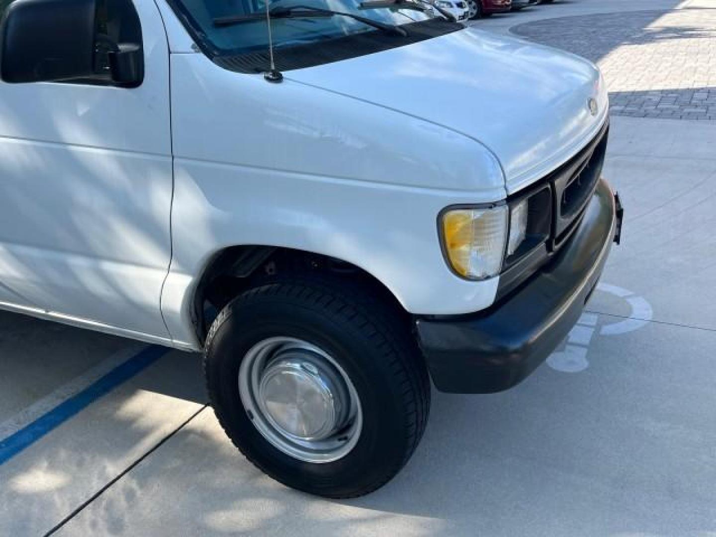 1998 Oxford White (CC) /Medium Graphite Ford Econoline Cargo Van AC LOW MILES 117,724 (1FTPE2427WH) with an 4.2L SEFI SPI V6 Engine engine, Automatic transmission, located at 4701 North Dixie Hwy, Pompano Beach, FL, 33064, (954) 422-2889, 26.240938, -80.123474 - OUR WEBPAGE FLORIDACARS1.COM HAS OVER 90 PHOTOS AND FREE CARFAX LINK 1998 FORD E-250 VIN: 1FTPE2427WHB73287 NO ACCIDENTS NO RECALLS VAN FLORIDA OWNER 4.2L V6 4.2L V6 F SOHC 24 SERVICE RECORDS GASOLINE ROAD READY WORK READY REAR WHEEL DRIVE 117,724 MILES THIS IS A GOOD WORK FORD VAN RETIREE FLORIDA T - Photo#68