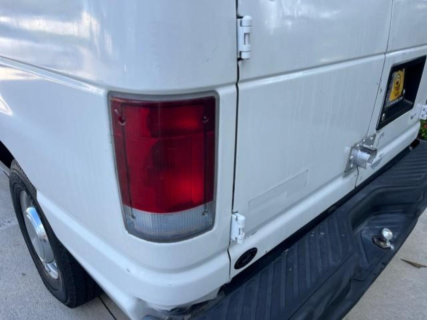 1998 Oxford White (CC) /Medium Graphite Ford Econoline Cargo Van AC LOW MILES 117,724 (1FTPE2427WH) with an 4.2L SEFI SPI V6 Engine engine, Automatic transmission, located at 4701 North Dixie Hwy, Pompano Beach, FL, 33064, (954) 422-2889, 26.240938, -80.123474 - OUR WEBPAGE FLORIDACARS1.COM HAS OVER 90 PHOTOS AND FREE CARFAX LINK 1998 FORD E-250 VIN: 1FTPE2427WHB73287 NO ACCIDENTS NO RECALLS VAN FLORIDA OWNER 4.2L V6 4.2L V6 F SOHC 24 SERVICE RECORDS GASOLINE ROAD READY WORK READY REAR WHEEL DRIVE 117,724 MILES THIS IS A GOOD WORK FORD VAN RETIREE FLORIDA T - Photo#81