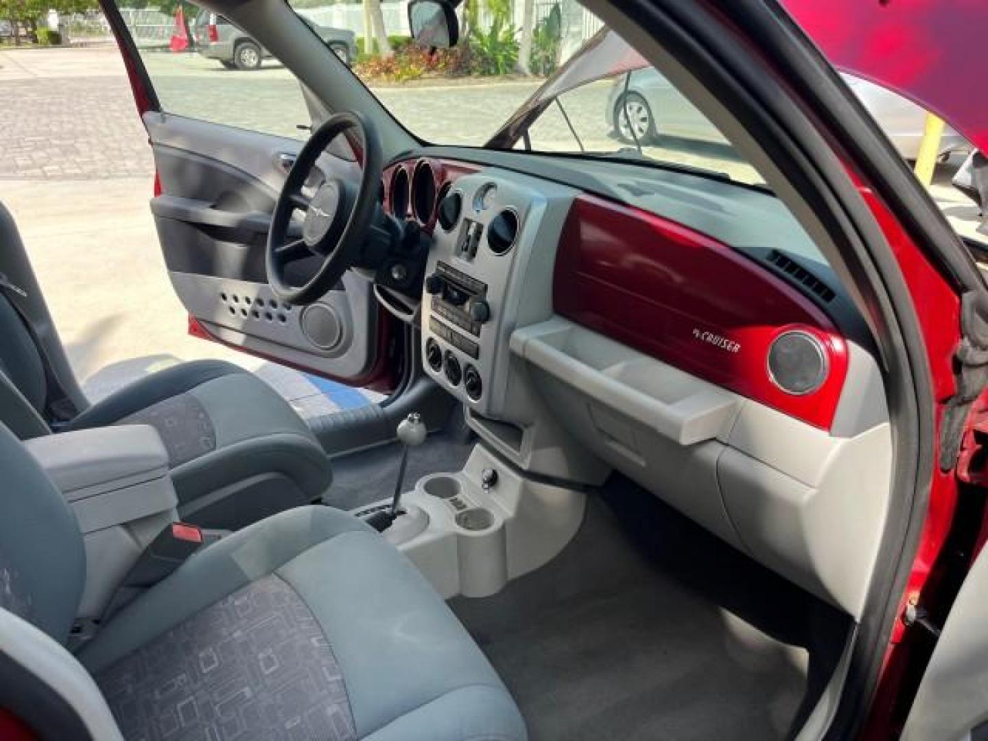 2009 Inferno Red Crystal Pearl /Pastel slate gray Chrysler PT Cruiser 1 FL LOW MILES 72,453 (3A8FY489X9T) with an 2.4L DOHC SMPI 16-Valve I4 Engine engine, Automatic transmission, located at 4701 North Dixie Hwy, Pompano Beach, FL, 33064, (954) 422-2889, 26.240938, -80.123474 - OUR WEBPAGE FLORIDACARS1.COM HAS OVER 100 PHOTOS AND FREE CARFAX LINK 2009 CHRYSLER PT CRUISER ROAD READY 2.4L I4 VIN: 3A8FY489X9T557035 NO RECALLS 26 MPG VAN 1 OWNER FLORIDA 2.4L I4 F DOHC 16V LOW MILES 72,453 GASOLINE 5 SERVICE RECORDS FRONT WHEEL DRIVE Additional Airbags Alloy Wheels Anti-Theft S - Photo#26