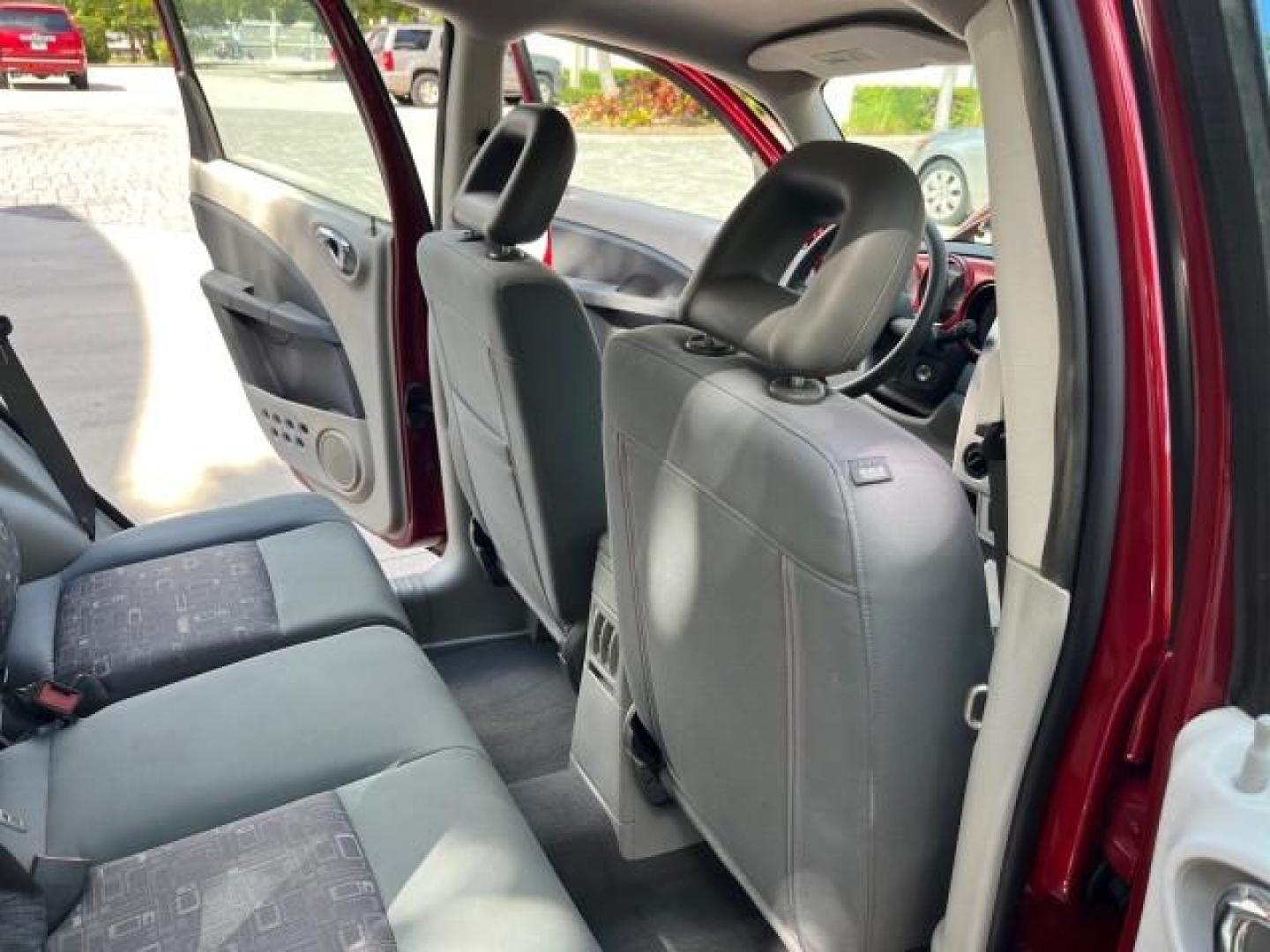 2009 Inferno Red Crystal Pearl /Pastel slate gray Chrysler PT Cruiser 1 FL LOW MILES 72,453 (3A8FY489X9T) with an 2.4L DOHC SMPI 16-Valve I4 Engine engine, Automatic transmission, located at 4701 North Dixie Hwy, Pompano Beach, FL, 33064, (954) 422-2889, 26.240938, -80.123474 - OUR WEBPAGE FLORIDACARS1.COM HAS OVER 100 PHOTOS AND FREE CARFAX LINK 2009 CHRYSLER PT CRUISER ROAD READY 2.4L I4 VIN: 3A8FY489X9T557035 NO RECALLS 26 MPG VAN 1 OWNER FLORIDA 2.4L I4 F DOHC 16V LOW MILES 72,453 GASOLINE 5 SERVICE RECORDS FRONT WHEEL DRIVE Additional Airbags Alloy Wheels Anti-Theft S - Photo#30