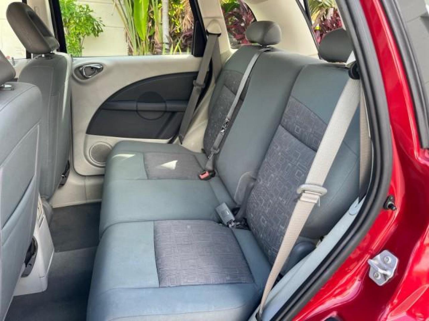 2009 Inferno Red Crystal Pearl /Pastel slate gray Chrysler PT Cruiser 1 FL LOW MILES 72,453 (3A8FY489X9T) with an 2.4L DOHC SMPI 16-Valve I4 Engine engine, Automatic transmission, located at 4701 North Dixie Hwy, Pompano Beach, FL, 33064, (954) 422-2889, 26.240938, -80.123474 - OUR WEBPAGE FLORIDACARS1.COM HAS OVER 100 PHOTOS AND FREE CARFAX LINK 2009 CHRYSLER PT CRUISER ROAD READY 2.4L I4 VIN: 3A8FY489X9T557035 NO RECALLS 26 MPG VAN 1 OWNER FLORIDA 2.4L I4 F DOHC 16V LOW MILES 72,453 GASOLINE 5 SERVICE RECORDS FRONT WHEEL DRIVE Additional Airbags Alloy Wheels Anti-Theft S - Photo#40