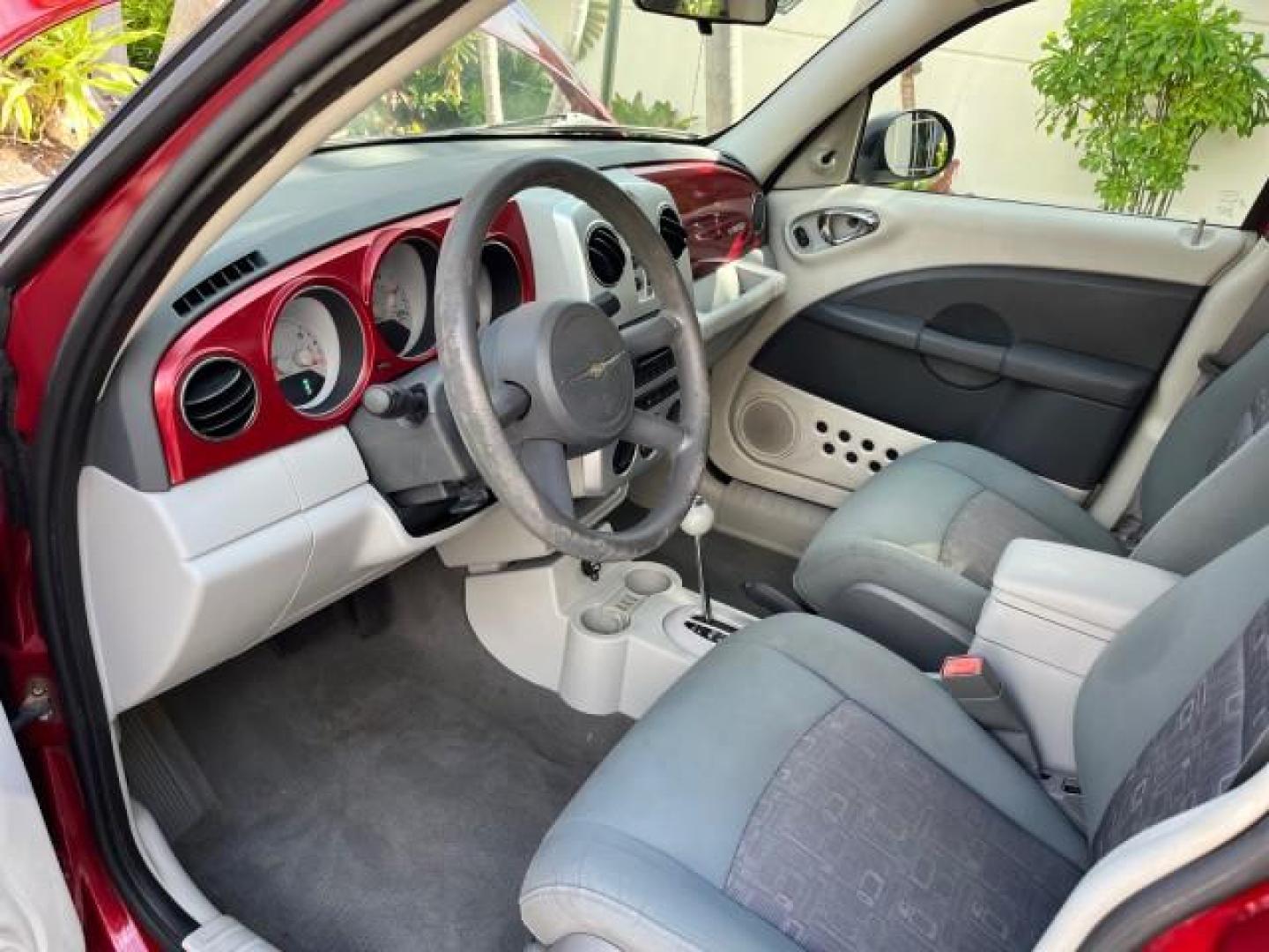 2009 Inferno Red Crystal Pearl /Pastel slate gray Chrysler PT Cruiser 1 FL LOW MILES 72,453 (3A8FY489X9T) with an 2.4L DOHC SMPI 16-Valve I4 Engine engine, Automatic transmission, located at 4701 North Dixie Hwy, Pompano Beach, FL, 33064, (954) 422-2889, 26.240938, -80.123474 - OUR WEBPAGE FLORIDACARS1.COM HAS OVER 100 PHOTOS AND FREE CARFAX LINK 2009 CHRYSLER PT CRUISER ROAD READY 2.4L I4 VIN: 3A8FY489X9T557035 NO RECALLS 26 MPG VAN 1 OWNER FLORIDA 2.4L I4 F DOHC 16V LOW MILES 72,453 GASOLINE 5 SERVICE RECORDS FRONT WHEEL DRIVE Additional Airbags Alloy Wheels Anti-Theft S - Photo#42