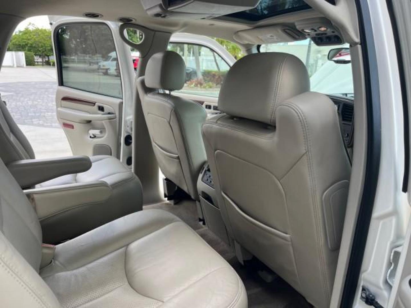 2004 White Diamond /Shale Cadillac Escalade 1 FL AWD LOW MILES 93,247 (1GYEK63N94R) with an 6.0L Vortec 6000 High-Output V8 SFI Engine engine, Automatic transmission, located at 4701 North Dixie Hwy, Pompano Beach, FL, 33064, (954) 422-2889, 26.240938, -80.123474 - OUR WEBPAGE FLORIDACARS1.COM HAS OVER 100 PHOTOS AND FREE CARFAX LINK $ 63,215 NEW 2004 CADILLAC ESCALADE ROAD READY 6.0L V8 VIN: 1GYEK63N94R229363 SUNROOF NO RECALLS AWD 4 DOOR WAGON/SPORT UTILITY DVD 1 OWNER FLORIDA 6.0L V8 F TOW PKG BACK UP CAMERA LOW MILES 93,247 GASOLINE DUAL AC AWD 3 ROW LEATH - Photo#32