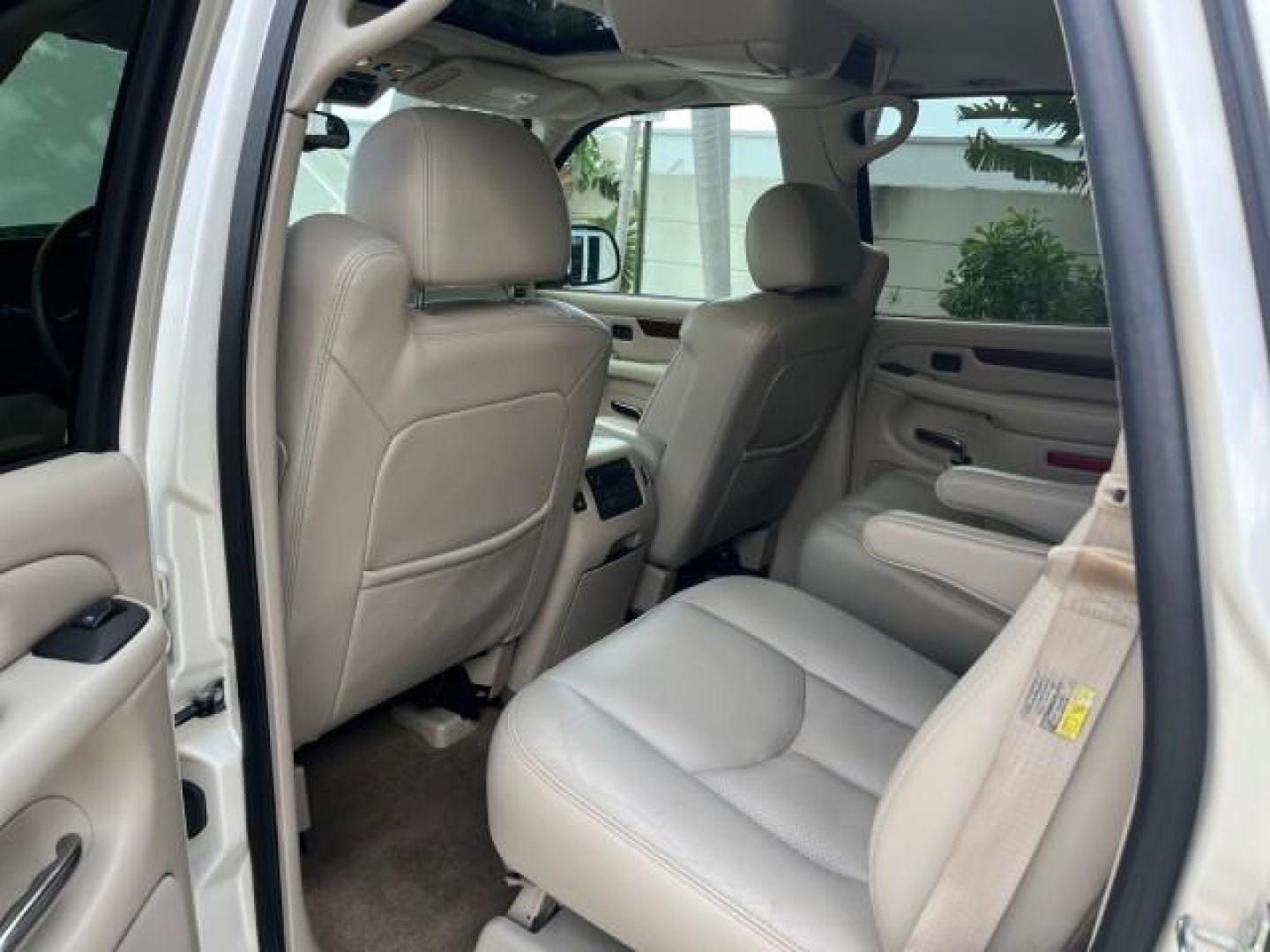 2004 White Diamond /Shale Cadillac Escalade 1 FL AWD LOW MILES 93,247 (1GYEK63N94R) with an 6.0L Vortec 6000 High-Output V8 SFI Engine engine, Automatic transmission, located at 4701 North Dixie Hwy, Pompano Beach, FL, 33064, (954) 422-2889, 26.240938, -80.123474 - OUR WEBPAGE FLORIDACARS1.COM HAS OVER 100 PHOTOS AND FREE CARFAX LINK $ 63,215 NEW 2004 CADILLAC ESCALADE ROAD READY 6.0L V8 VIN: 1GYEK63N94R229363 SUNROOF NO RECALLS AWD 4 DOOR WAGON/SPORT UTILITY DVD 1 OWNER FLORIDA 6.0L V8 F TOW PKG BACK UP CAMERA LOW MILES 93,247 GASOLINE DUAL AC AWD 3 ROW LEATH - Photo#45