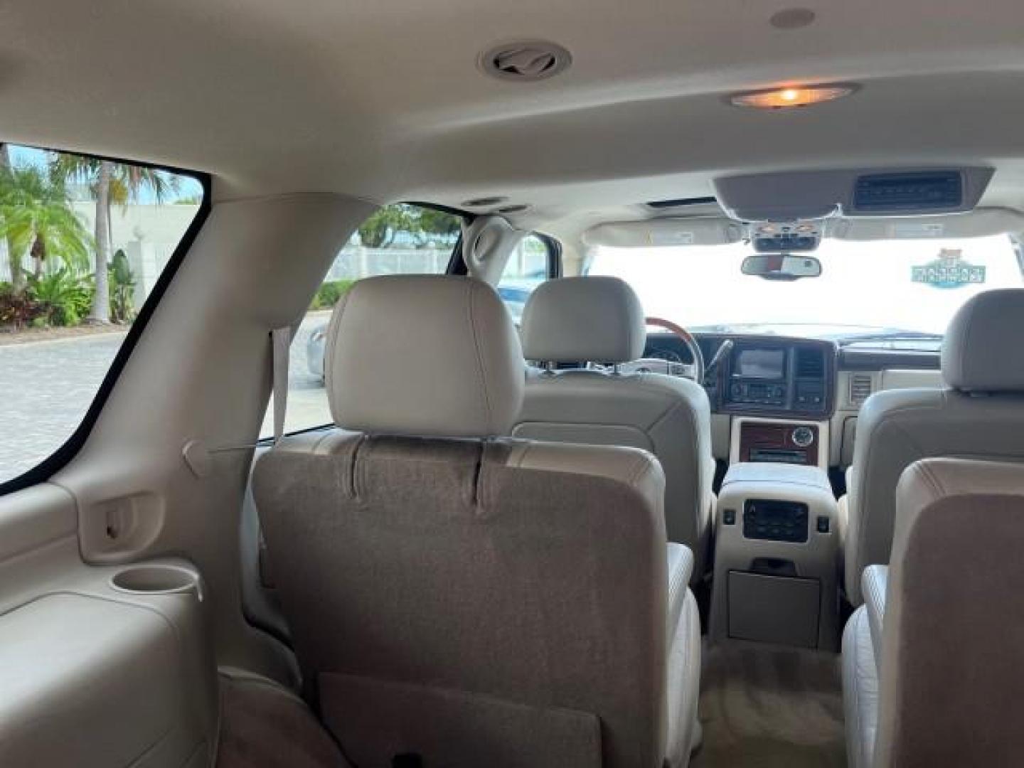 2004 White Diamond /Shale Cadillac Escalade 1 FL AWD LOW MILES 93,247 (1GYEK63N94R) with an 6.0L Vortec 6000 High-Output V8 SFI Engine engine, Automatic transmission, located at 4701 North Dixie Hwy, Pompano Beach, FL, 33064, (954) 422-2889, 26.240938, -80.123474 - OUR WEBPAGE FLORIDACARS1.COM HAS OVER 100 PHOTOS AND FREE CARFAX LINK $ 63,215 NEW 2004 CADILLAC ESCALADE ROAD READY 6.0L V8 VIN: 1GYEK63N94R229363 SUNROOF NO RECALLS AWD 4 DOOR WAGON/SPORT UTILITY DVD 1 OWNER FLORIDA 6.0L V8 F TOW PKG BACK UP CAMERA LOW MILES 93,247 GASOLINE DUAL AC AWD 3 ROW LEATH - Photo#79