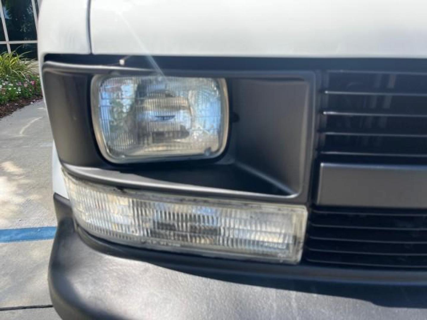 2002 Ivory White /Medium Gray Chevrolet Astro Cargo Van LOW MILES 65,497 (1GCDM19X22B) with an 4.3L Vortec 4300 MFI V6 Engine engine, Automatic transmission, located at 4701 North Dixie Hwy, Pompano Beach, FL, 33064, (954) 422-2889, 26.240938, -80.123474 - OUR WEBPAGE FLORIDACARS1.COM HAS OVER 100 PHOTOS AND FREE CARFAX LINK 2002 CHEVROLET ASTRO ROAD READY WORK READY VIN: 1GCDM19X22B117985 NO ACCIDENTS NO RECALLS VAN FLORIDA OWNER 4,3L V6 4.3L V6 F OHV 12V LOW MILES 65,497 GASOLINE 6 SERVICE RECORDS REAR WHEEL DRIVE Anti-Theft System Approach Lights F - Photo#66