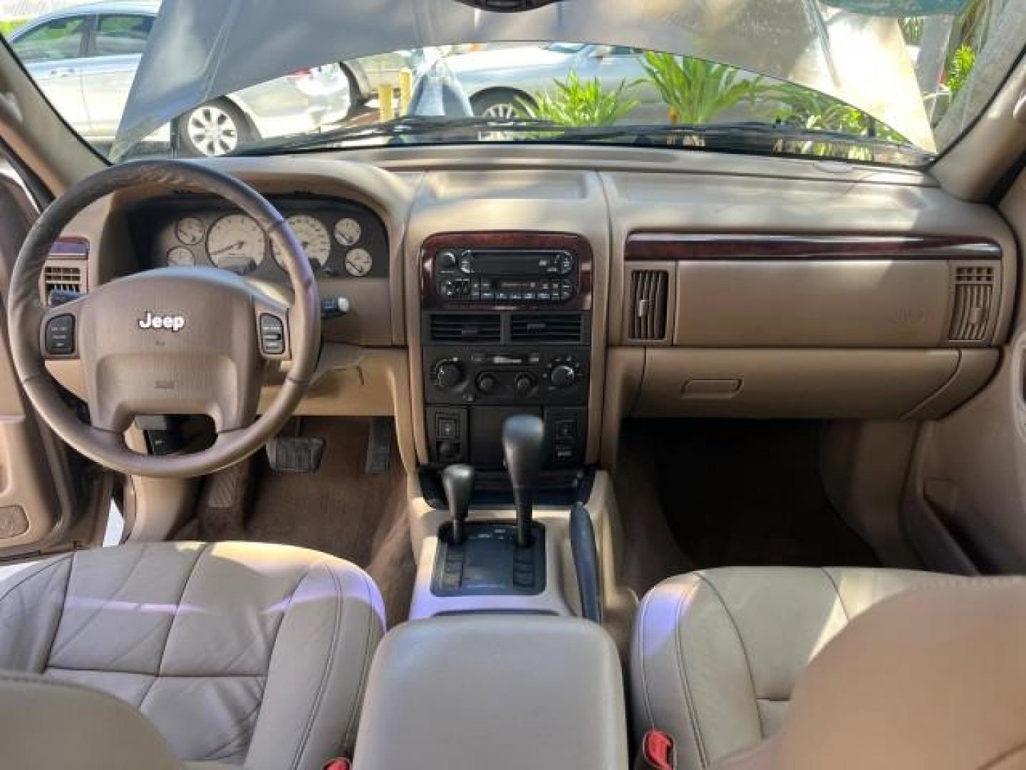 2002 Graphite Metallic /Dark Slate Gray Jeep Grand Cherokee 4WD V 8 Limited LOW MILES 78,358 (1J4GW58N42C) with an 4.7L SOHC SMFI V8 Power Tech Engine engine, Automatic transmission, located at 4701 North Dixie Hwy, Pompano Beach, FL, 33064, (954) 422-2889, 26.240938, -80.123474 - OUR WEBPAGE FLORIDACARS1.COM HAS OVER 100 PHOTOS AND FREE CARFAX LINK 2002 JEEP GRAND CHEROKEE LIMITED ROAD READY 4.7L V8 VIN: 1J4GW58N42C253456 NO ACCIDENTS 4WD 4X4 4 DOOR WAGON/SPORT UTILITY NO RECALLS LIMITED 4.7L V8 F SOHC TOW PKG POWER LEATHER SEATS GASOLINE POWER SUNROOF REAR WHEEL DRIVE W/ 4X - Photo#33