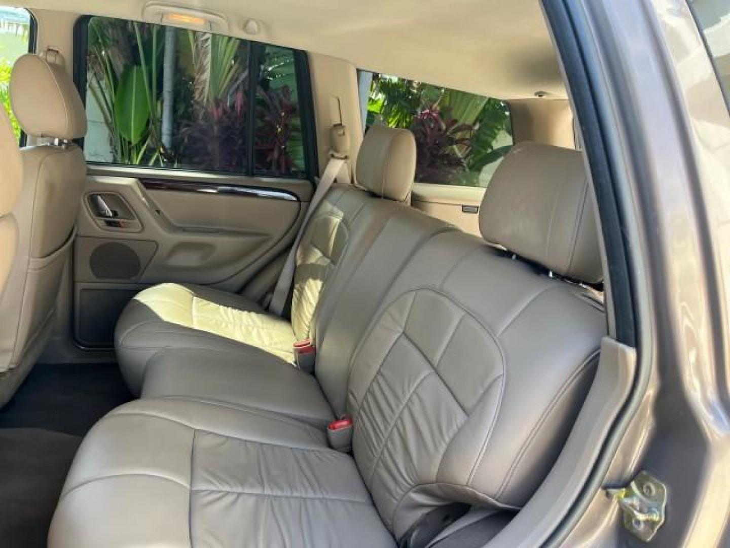 2002 Graphite Metallic /Dark Slate Gray Jeep Grand Cherokee 4WD V 8 Limited LOW MILES 78,358 (1J4GW58N42C) with an 4.7L SOHC SMFI V8 Power Tech Engine engine, Automatic transmission, located at 4701 North Dixie Hwy, Pompano Beach, FL, 33064, (954) 422-2889, 26.240938, -80.123474 - OUR WEBPAGE FLORIDACARS1.COM HAS OVER 100 PHOTOS AND FREE CARFAX LINK 2002 JEEP GRAND CHEROKEE LIMITED ROAD READY 4.7L V8 VIN: 1J4GW58N42C253456 NO ACCIDENTS 4WD 4X4 4 DOOR WAGON/SPORT UTILITY NO RECALLS LIMITED 4.7L V8 F SOHC TOW PKG POWER LEATHER SEATS GASOLINE POWER SUNROOF REAR WHEEL DRIVE W/ 4X - Photo#39