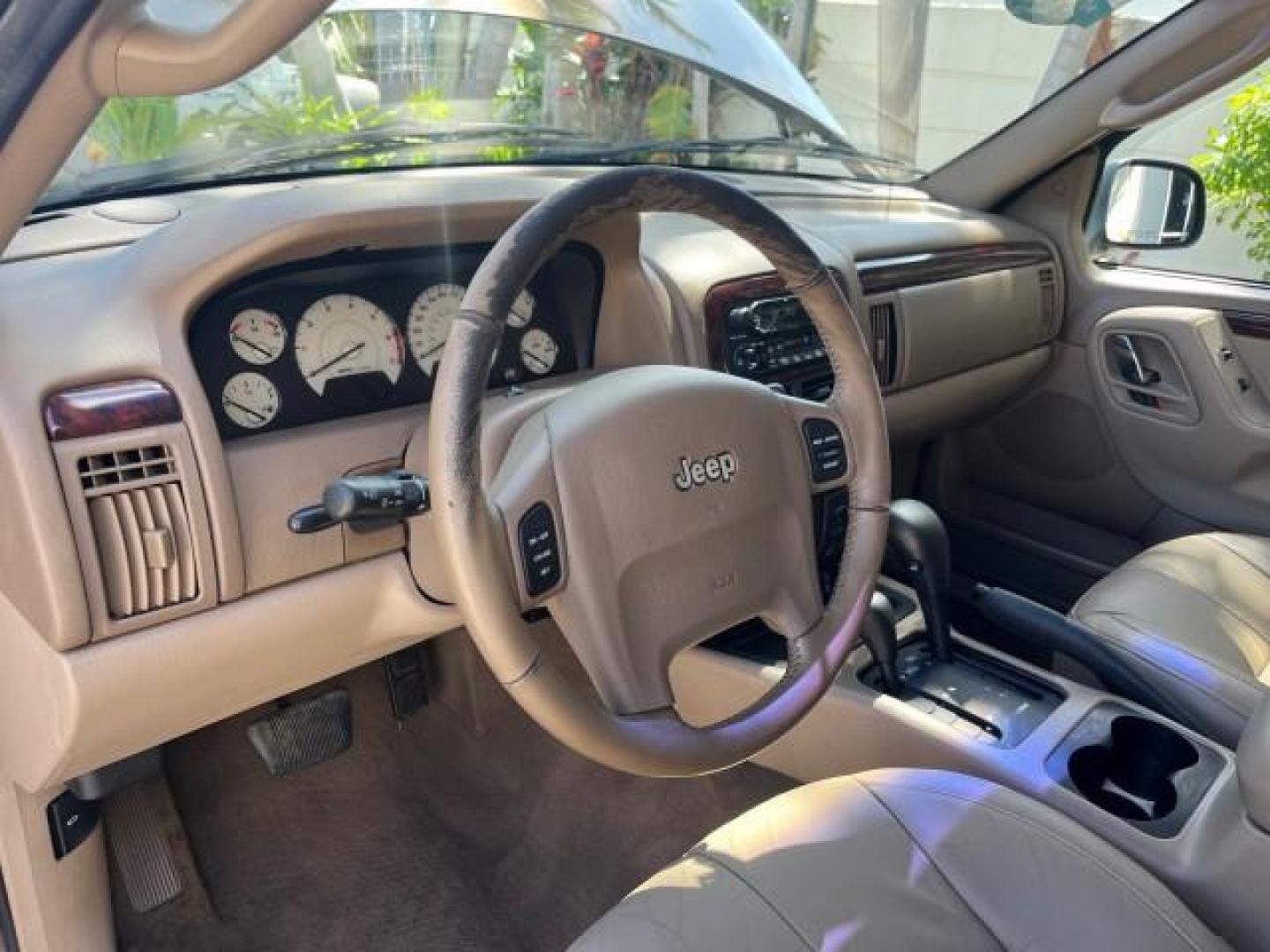 2002 Graphite Metallic /Dark Slate Gray Jeep Grand Cherokee 4WD V 8 Limited LOW MILES 78,358 (1J4GW58N42C) with an 4.7L SOHC SMFI V8 Power Tech Engine engine, Automatic transmission, located at 4701 North Dixie Hwy, Pompano Beach, FL, 33064, (954) 422-2889, 26.240938, -80.123474 - OUR WEBPAGE FLORIDACARS1.COM HAS OVER 100 PHOTOS AND FREE CARFAX LINK 2002 JEEP GRAND CHEROKEE LIMITED ROAD READY 4.7L V8 VIN: 1J4GW58N42C253456 NO ACCIDENTS 4WD 4X4 4 DOOR WAGON/SPORT UTILITY NO RECALLS LIMITED 4.7L V8 F SOHC TOW PKG POWER LEATHER SEATS GASOLINE POWER SUNROOF REAR WHEEL DRIVE W/ 4X - Photo#43