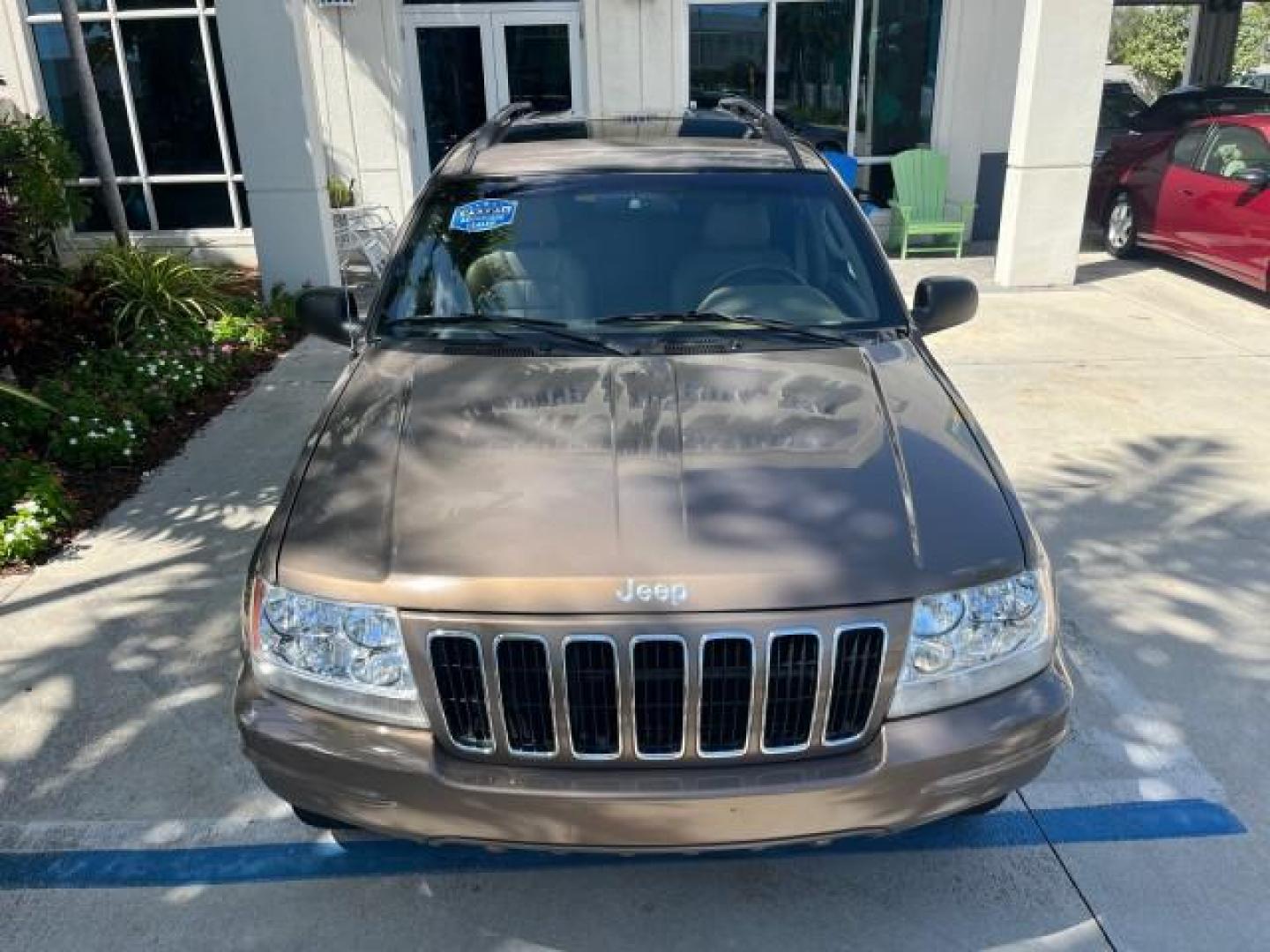 2002 Graphite Metallic /Dark Slate Gray Jeep Grand Cherokee 4WD V 8 Limited LOW MILES 78,358 (1J4GW58N42C) with an 4.7L SOHC SMFI V8 Power Tech Engine engine, Automatic transmission, located at 4701 North Dixie Hwy, Pompano Beach, FL, 33064, (954) 422-2889, 26.240938, -80.123474 - OUR WEBPAGE FLORIDACARS1.COM HAS OVER 100 PHOTOS AND FREE CARFAX LINK 2002 JEEP GRAND CHEROKEE LIMITED ROAD READY 4.7L V8 VIN: 1J4GW58N42C253456 NO ACCIDENTS 4WD 4X4 4 DOOR WAGON/SPORT UTILITY NO RECALLS LIMITED 4.7L V8 F SOHC TOW PKG POWER LEATHER SEATS GASOLINE POWER SUNROOF REAR WHEEL DRIVE W/ 4X - Photo#80